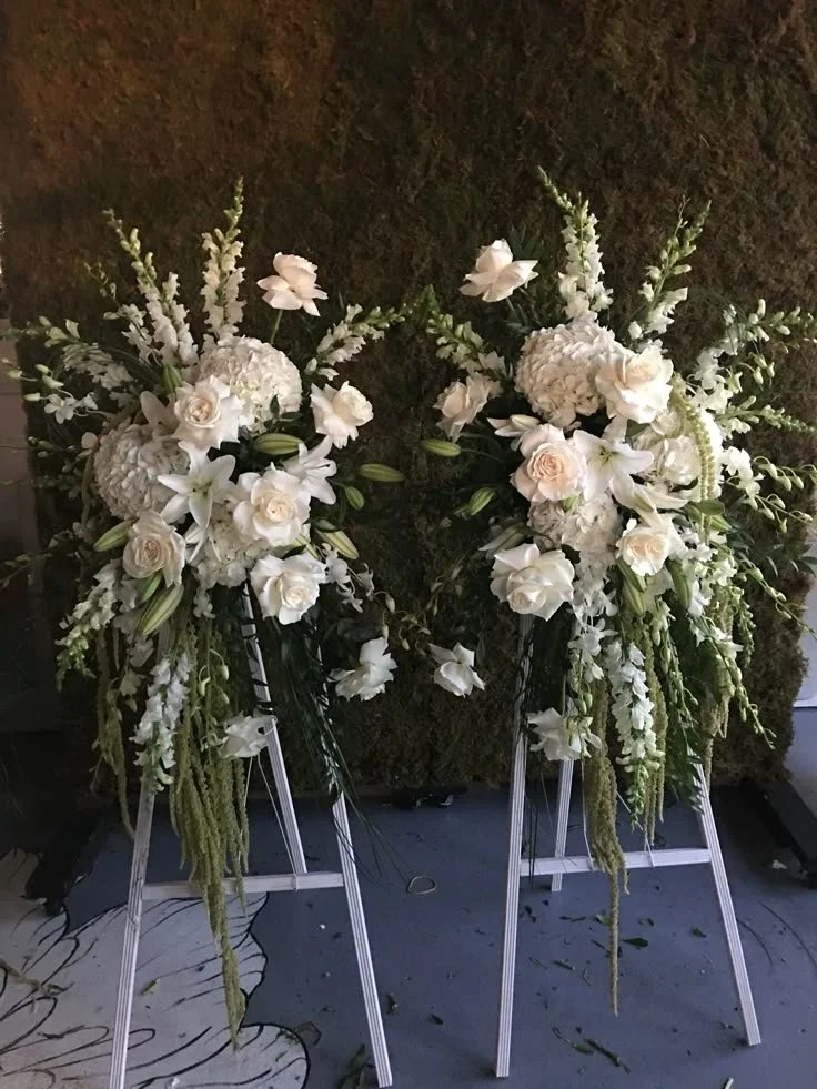 Pomp&Bloom white floral sympathy funeral arrangements.jpg