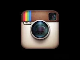 Instagram logo featuring a vintage camera with a rainbow stripe.