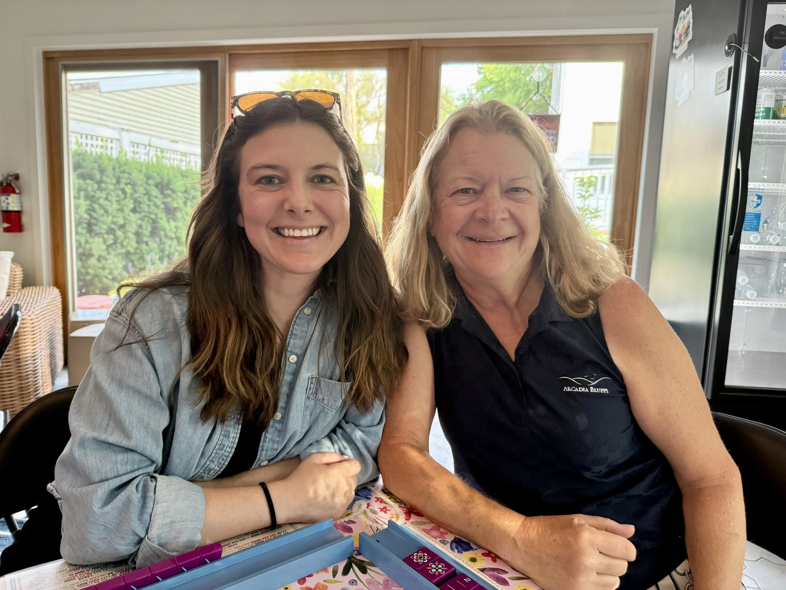 Mother Daughter gathered around a Mahjong table at Open Play