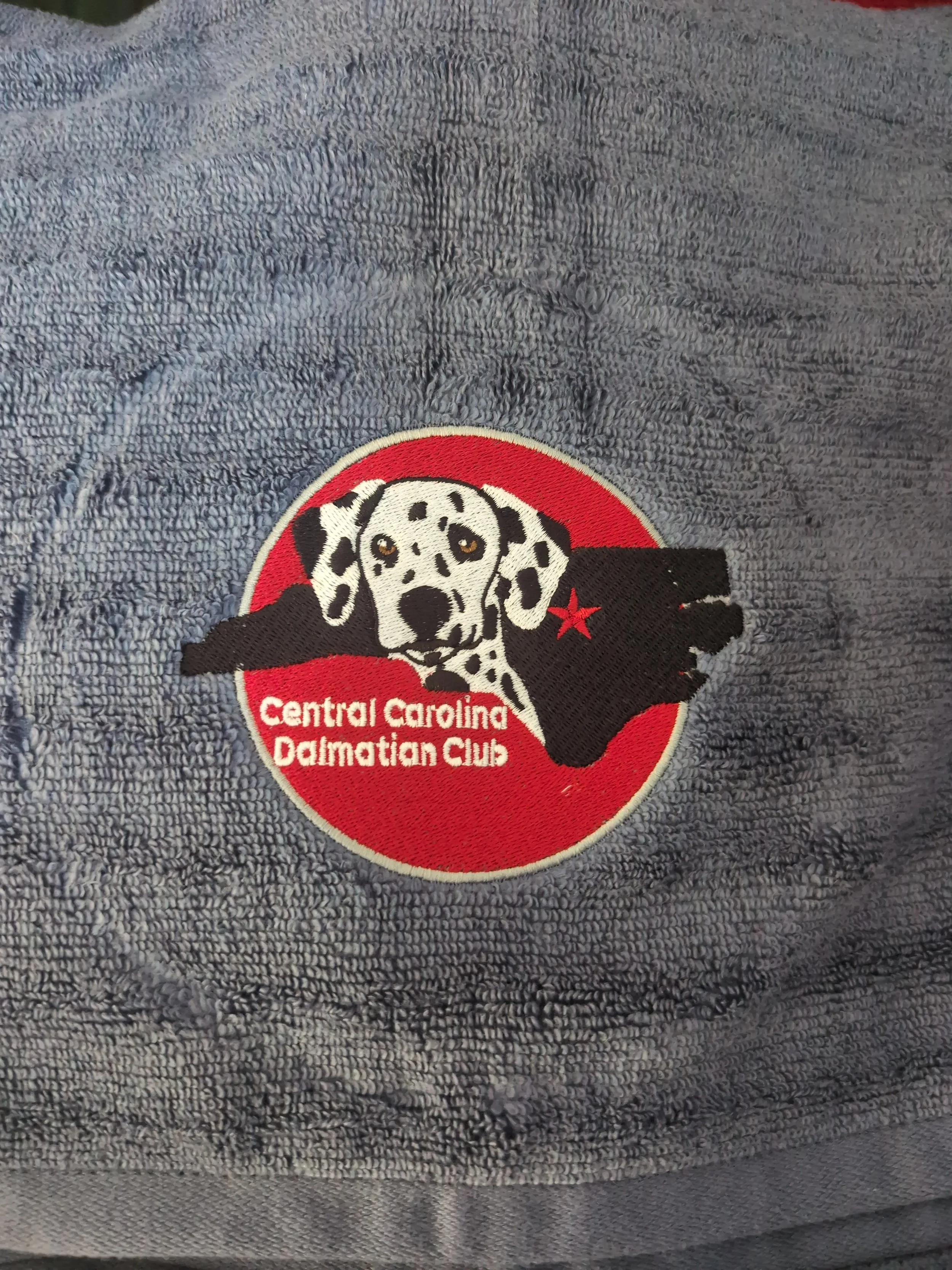 Patch with an illustration of a Dalmatian dog and a map of North Carolina, with the text 'Central Carolina Dalmatian Club'