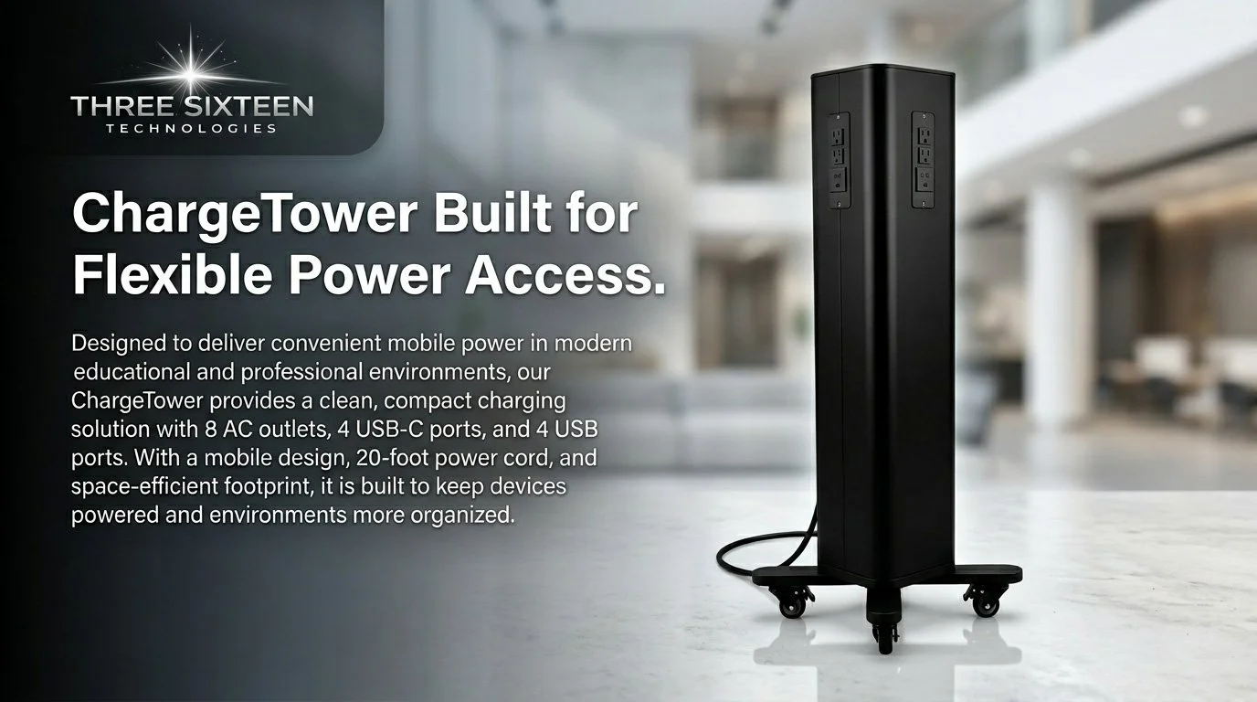 A black portable charging station with multiple outlets and USB ports, called ChargeTower, on wheels in a modern indoor setting.