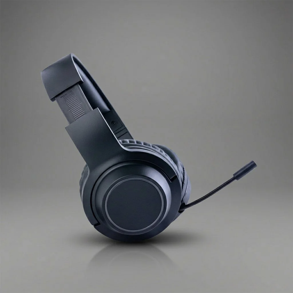 Black over-ear gaming headset with microphone on a plain background.