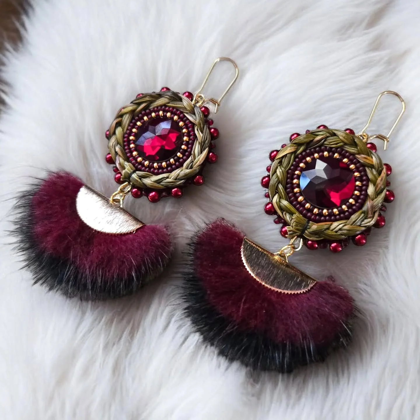 These burgundy beauties are available for sale 💫 Featuring 24k gold-plated beads, K9 crystal cabochons and genuine mink fur drops. Priced at $155 plus $20 shipping. Dm me to purchase!