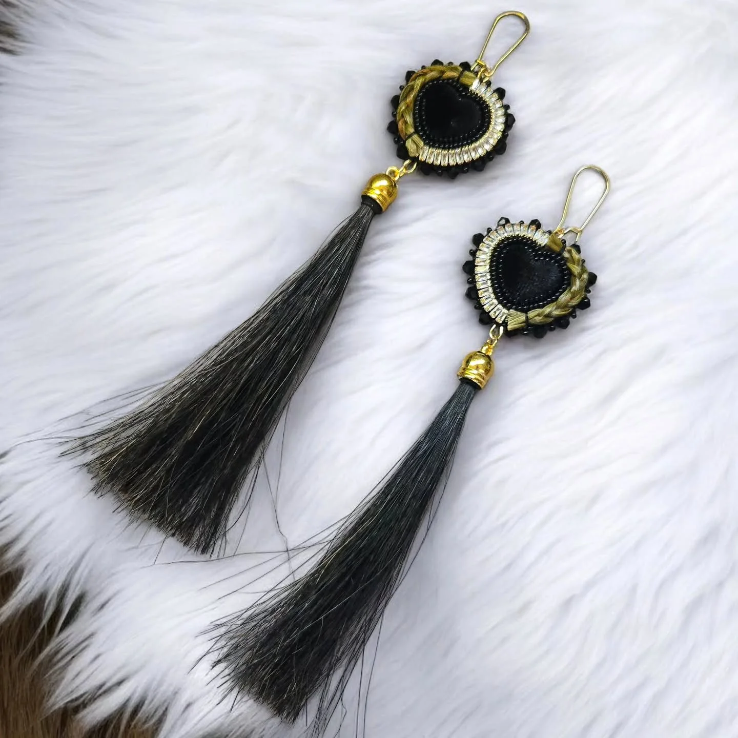Black velvet heart sweetgrass earrings with genuine horse hair tassles. Priced at $155 Canadian plus $20 shipping. Please dm me to purchase!