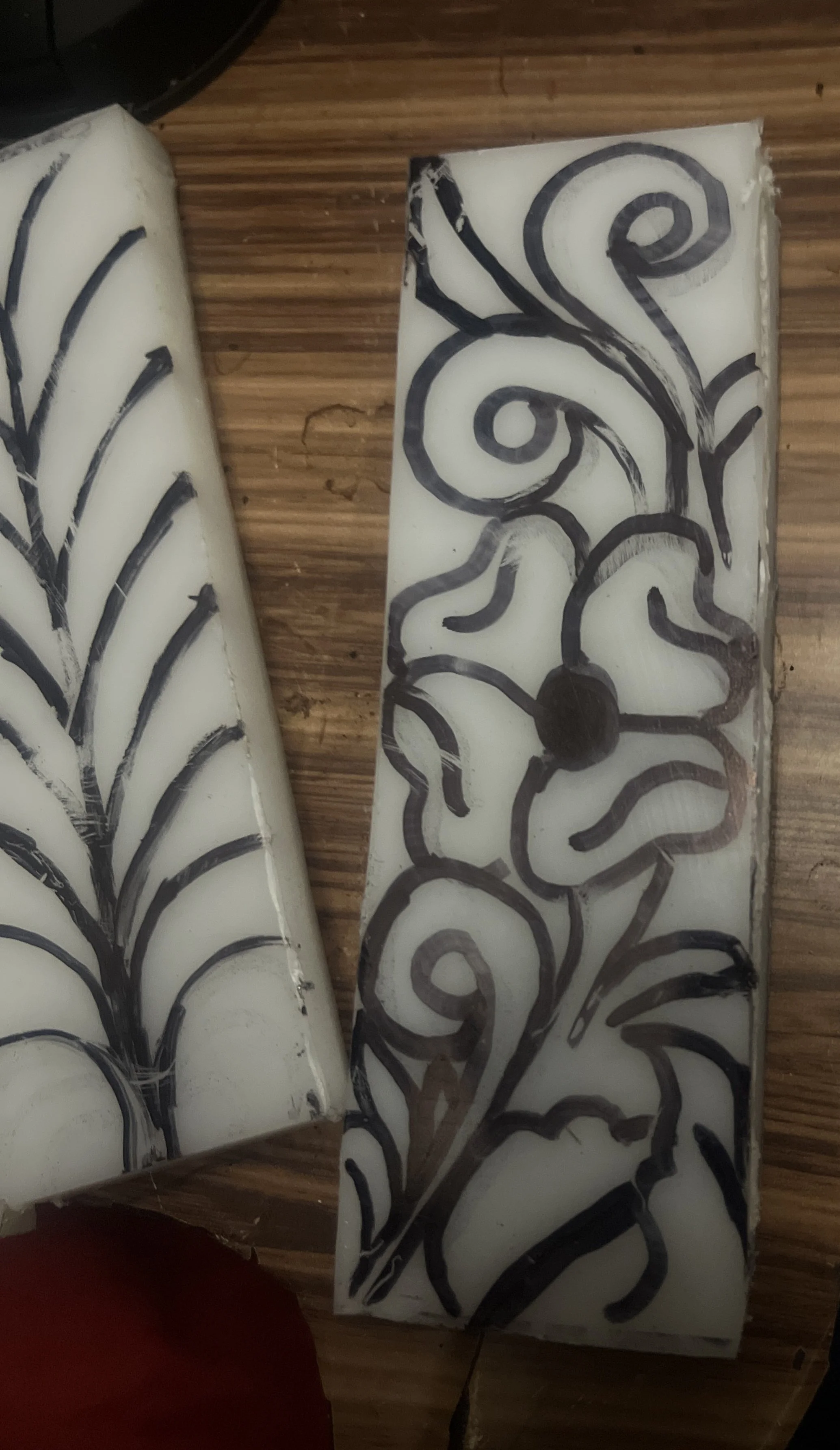 Experimental traditional tooled leather pattern Damascus Micarta.