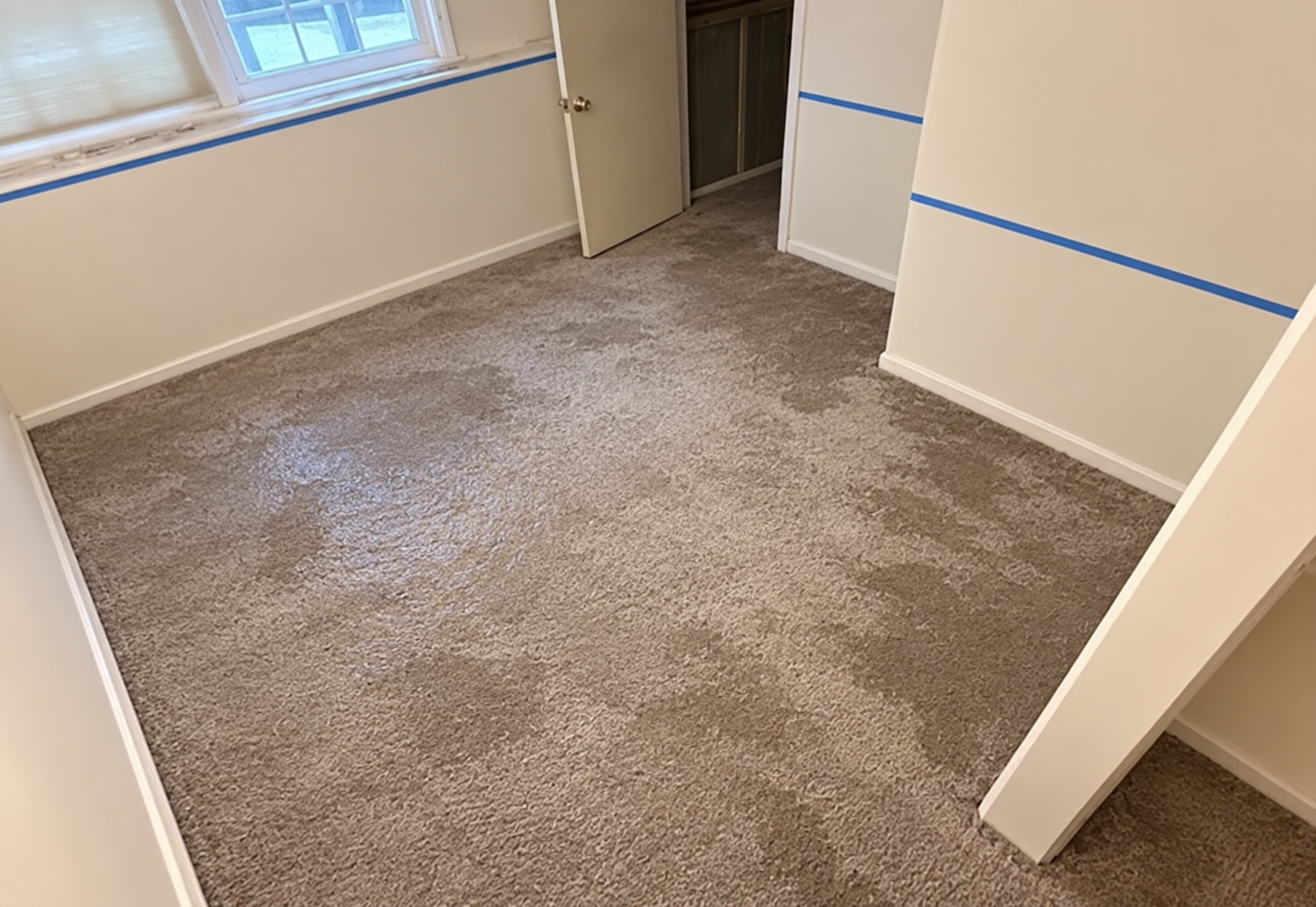 Wet carpet and repaired walls.png