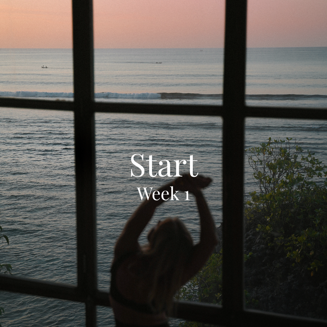 A person with long hair sitting on a windowsill, looking out at the ocean during sunset, with the words 'Start Week 1' overlaid on the image.