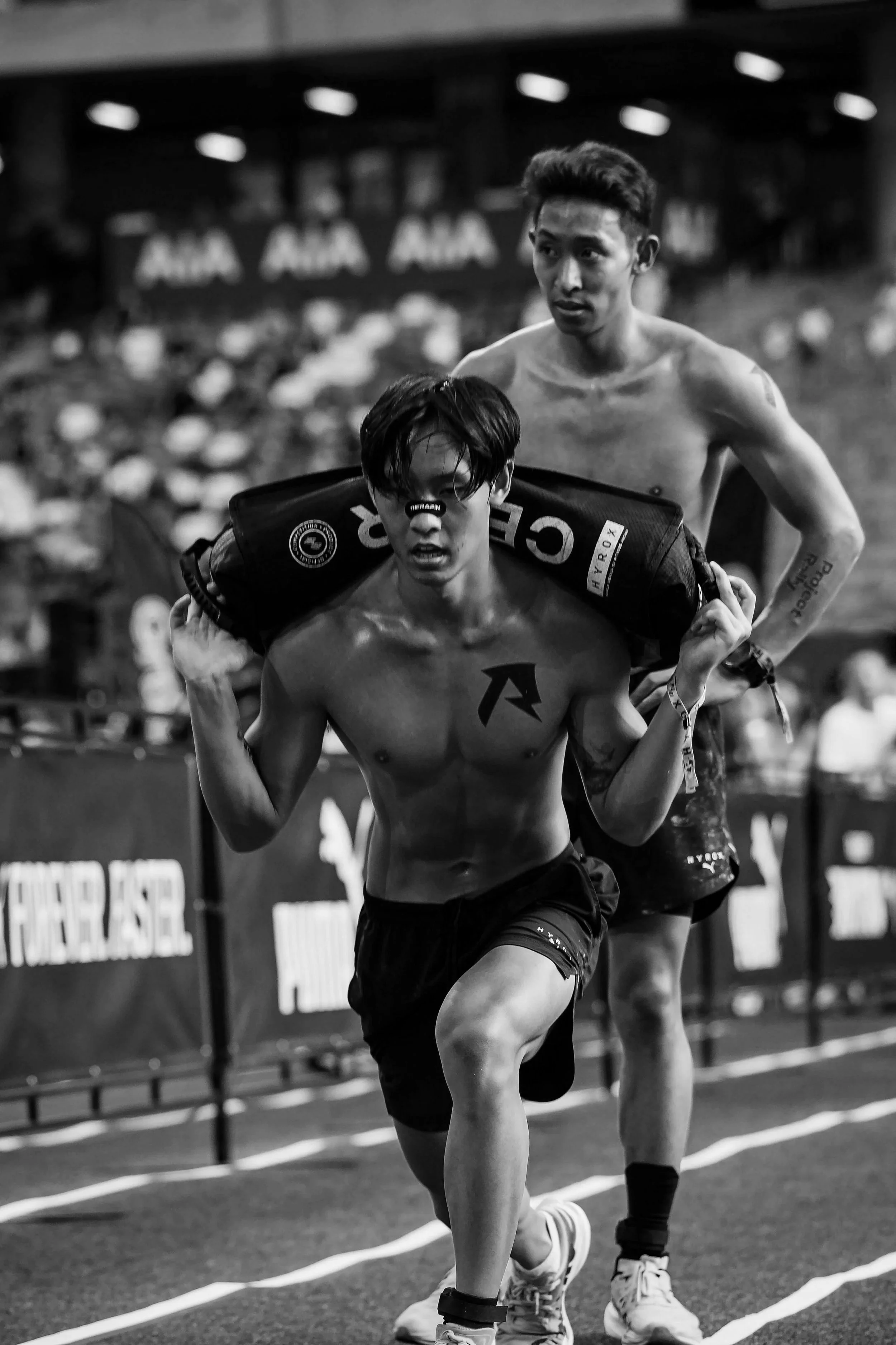 High-intensity HYROX training with running and weighted carry in a Balestier Singapore hybrid gym