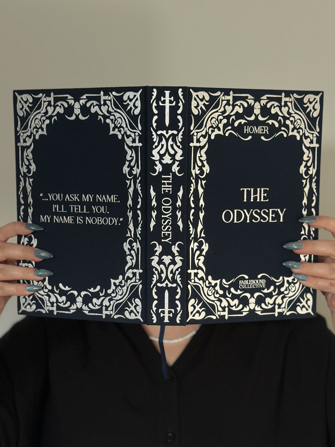 Open view of The Odyssey collector’s edition showing the front cover, spine and back cover design.