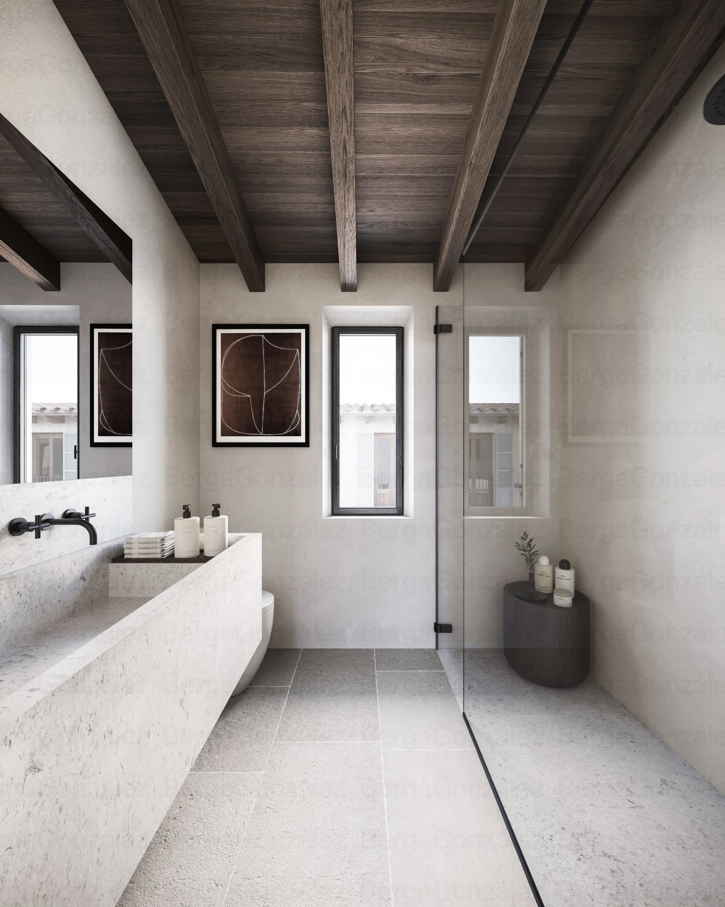Modern bathroom with stone sink, black faucet, two small soap dispensers, framed artwork, tall windows, and a glass shower door.