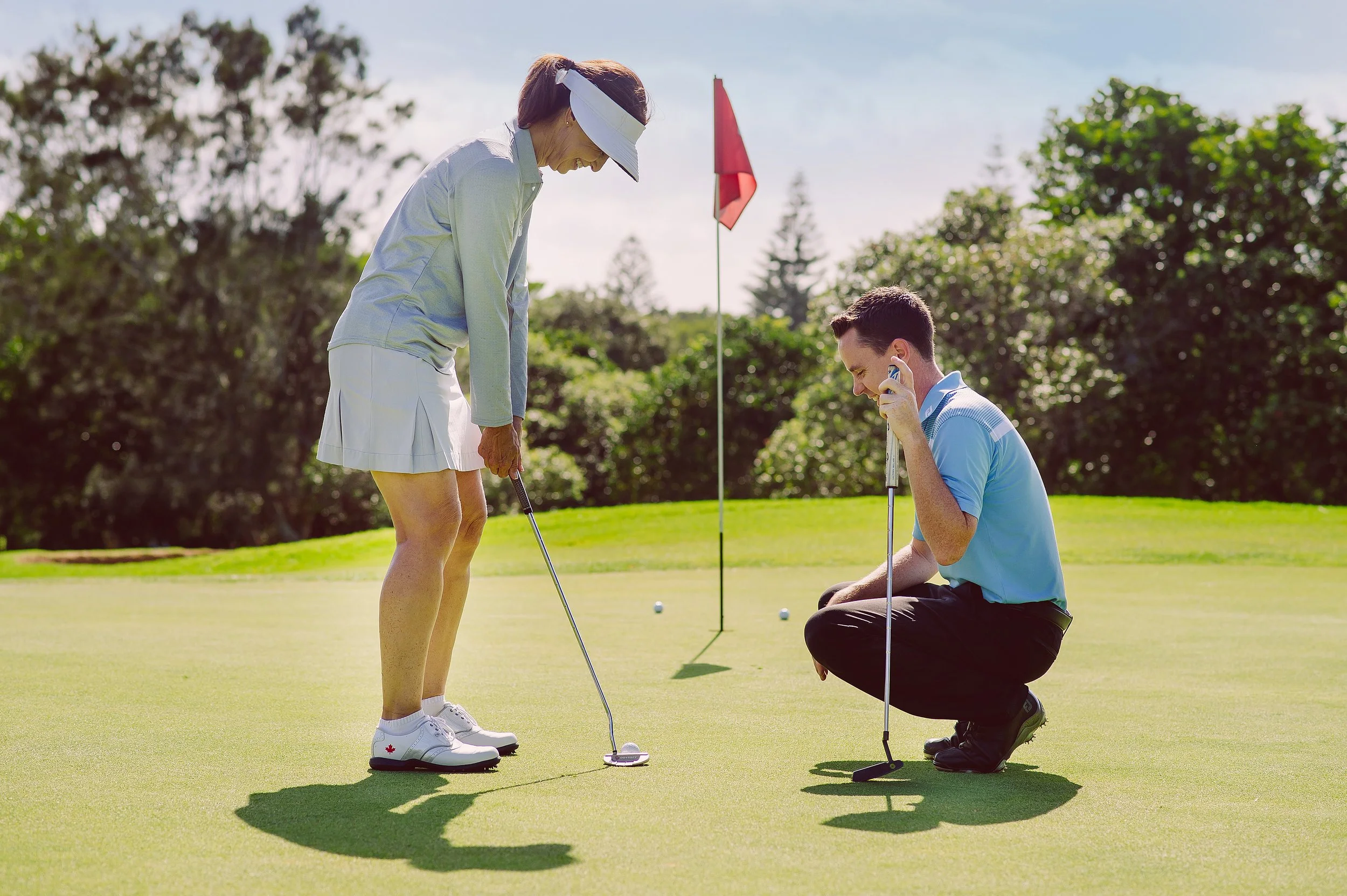 photo of James coaching a golf player