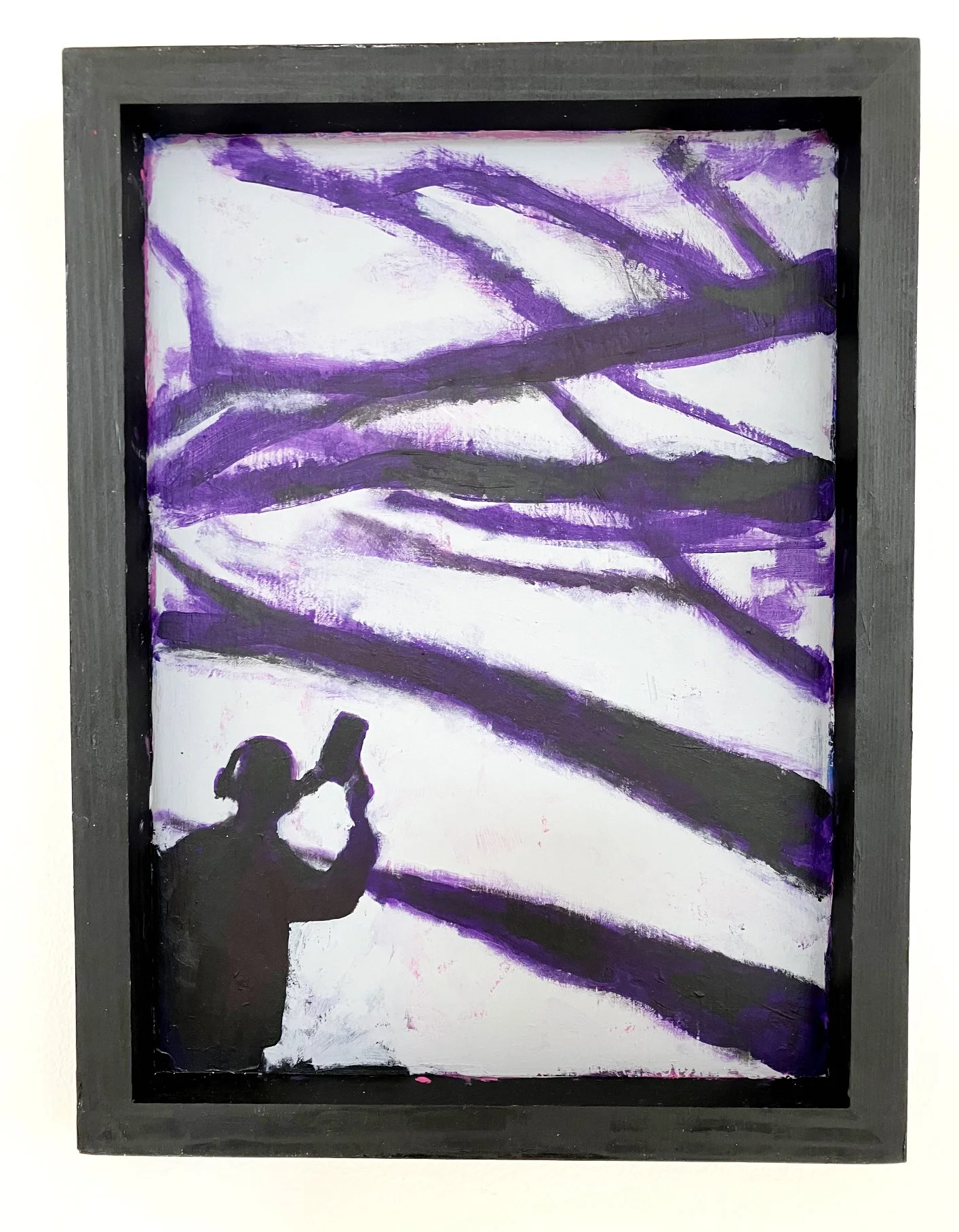 Silhouette of a person holding up a phone or camera, with a background of abstract purple and black tree branches or lines.