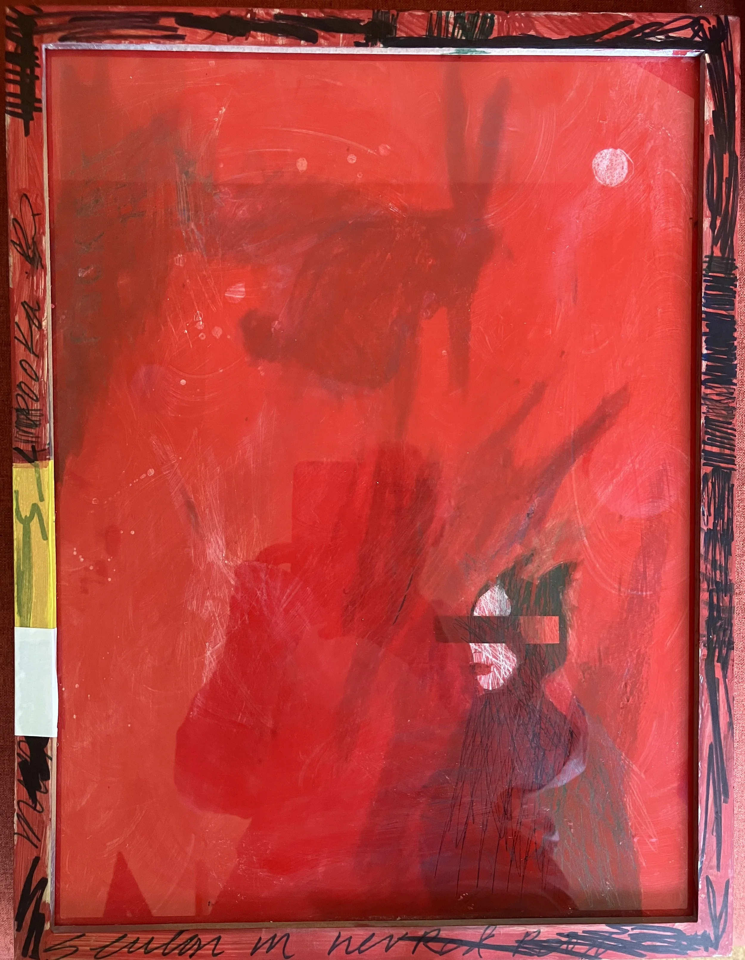 An abstract red painting with black, white, and yellow scribbles along the frame edges.