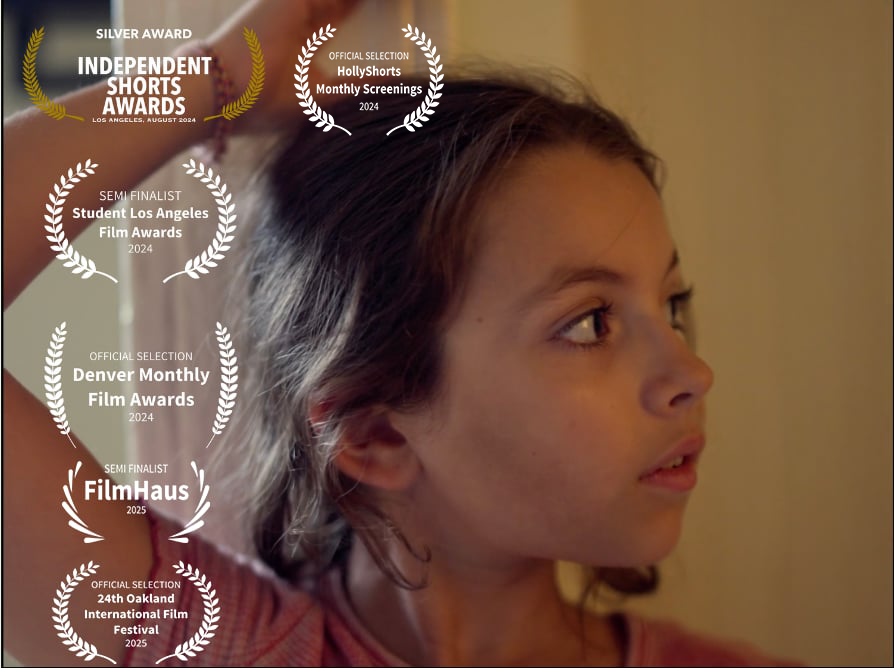 Side profile of a young girl with brown hair and light skin, looking to the right in a warm indoor setting, with film awards and selections overlayed on the left side of the image.