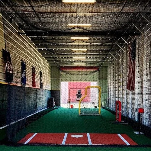 Empty batting cage with all tools.