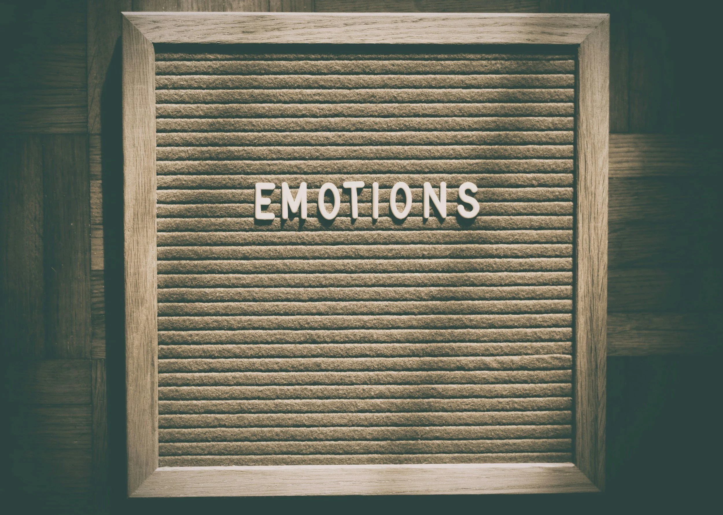 pegboard with the word emotions displayed on it