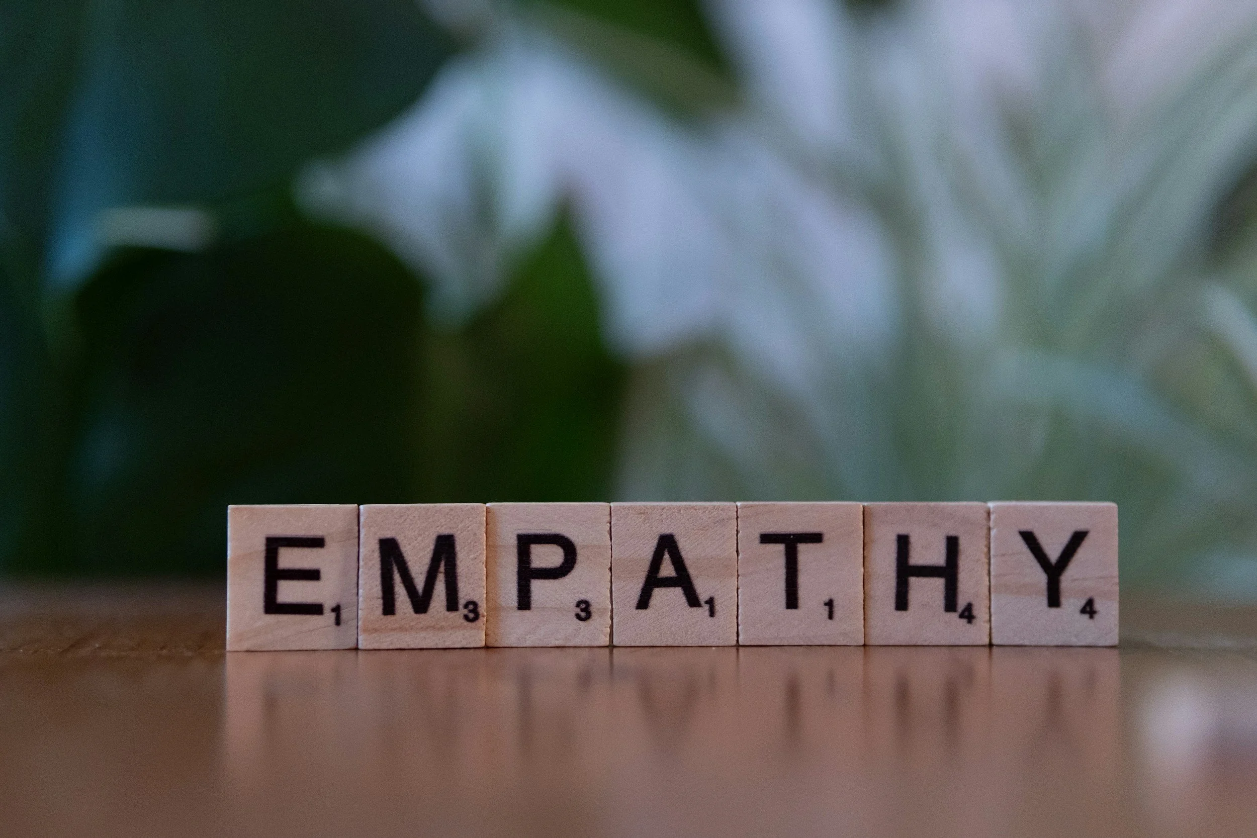 The word Empathy using scrabble tiles