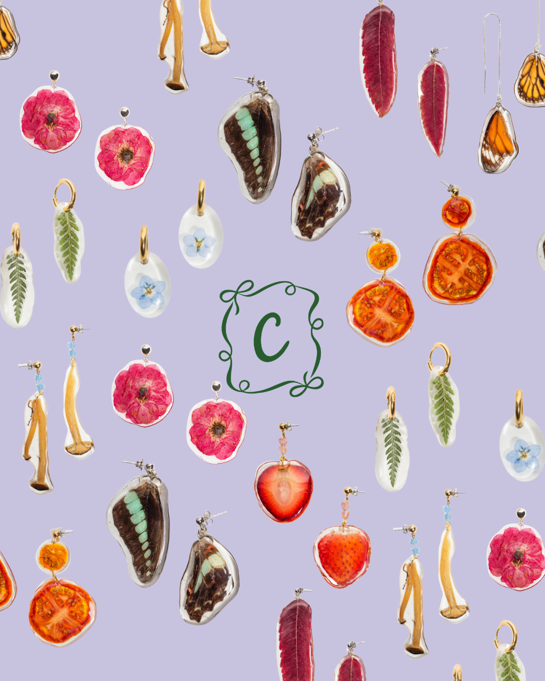 Assorted colorful earrings with floral, fruit, leaf, and butterfly designs on a lavender background, with a green monogram 'C' in the center.