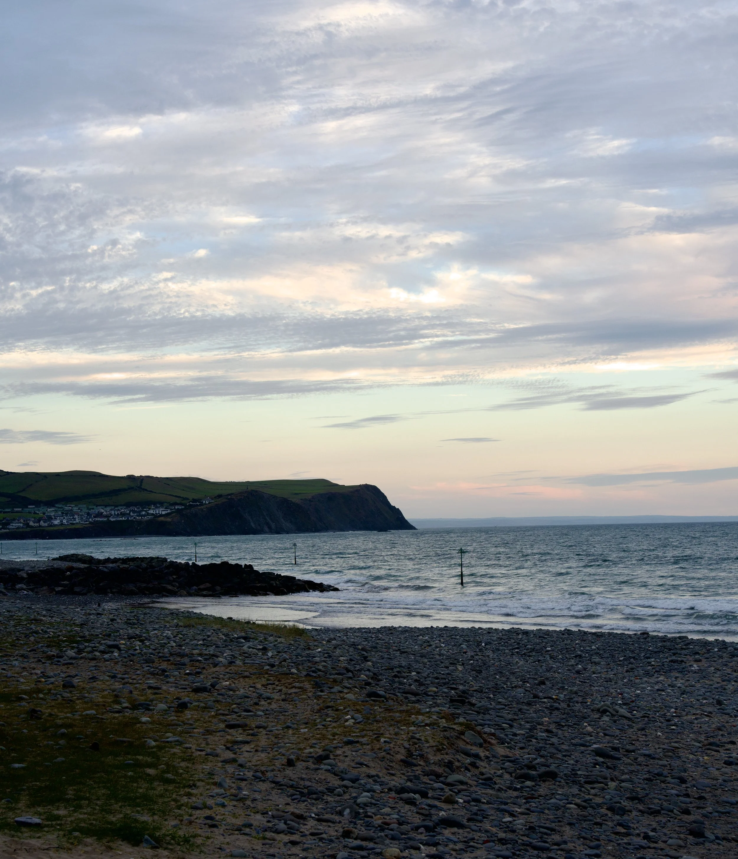 Wales,sunset,sunrise,landscape,ocean,shoreline,seaside,hills,sand,gravel,pebbles, clouds
