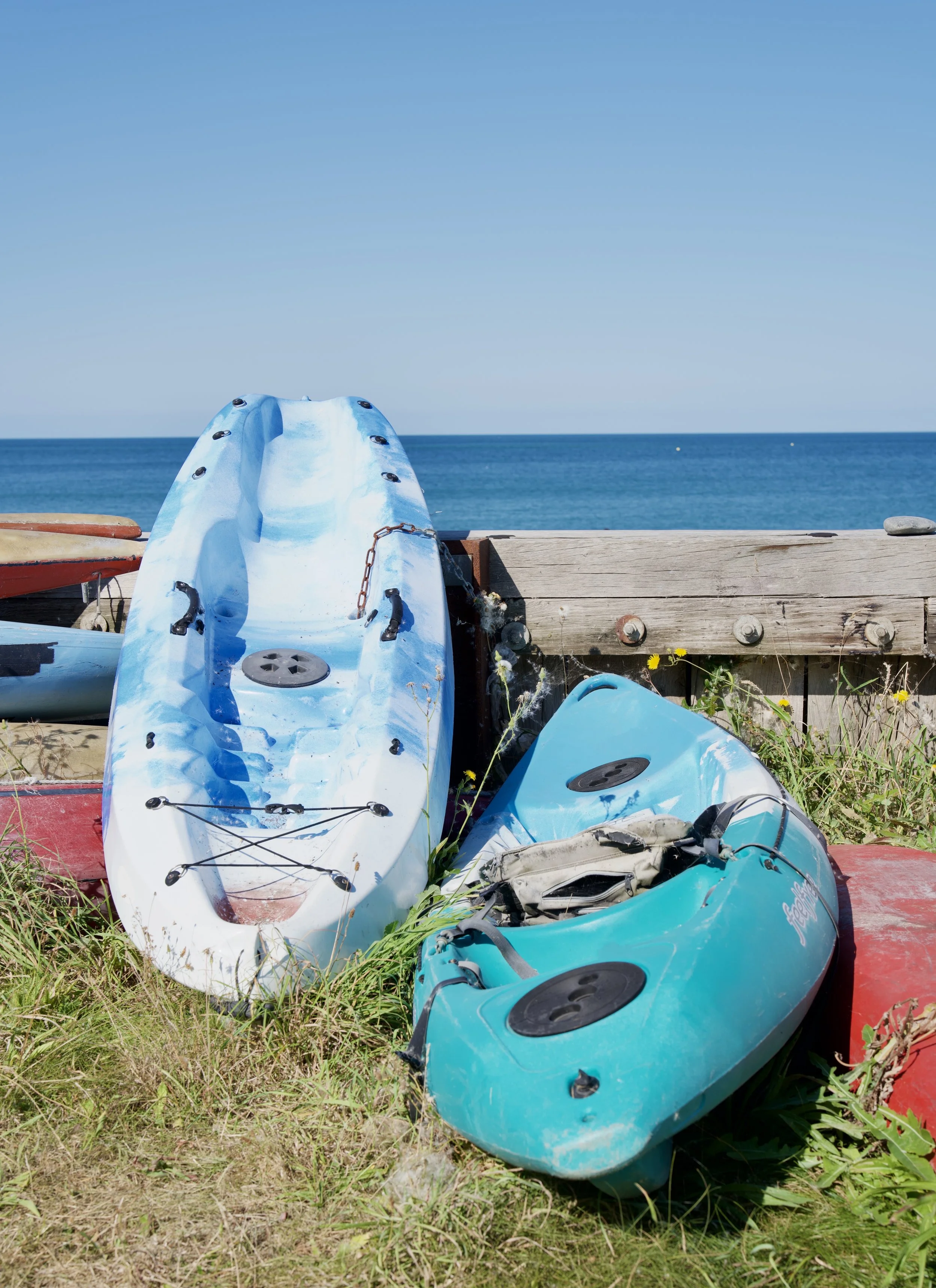 canoes on beach in wales.jpg
