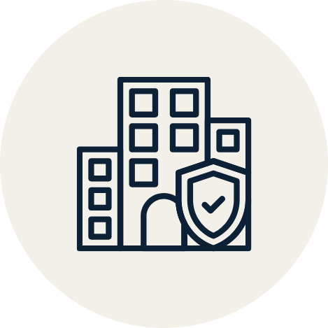 Outline illustration of a city skyline with a shield and checkmark symbol in front of the buildings.