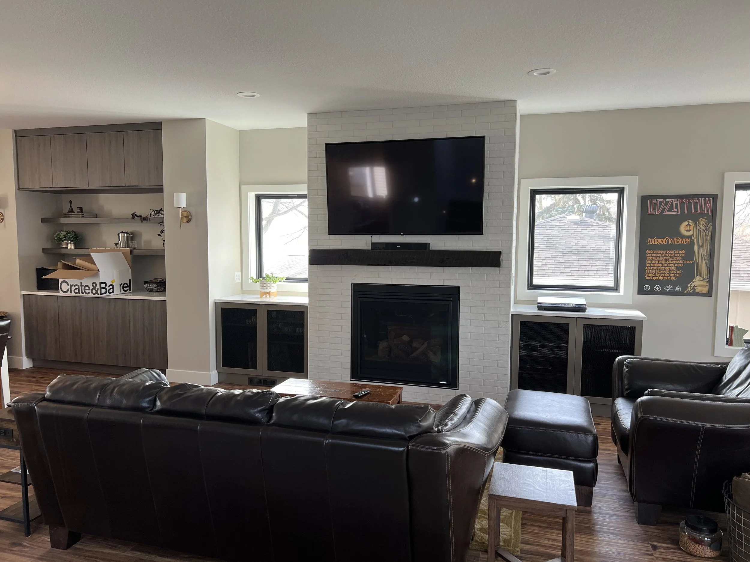 16 modern-living-room-fireplace-built-ins-lake-home.jpeg