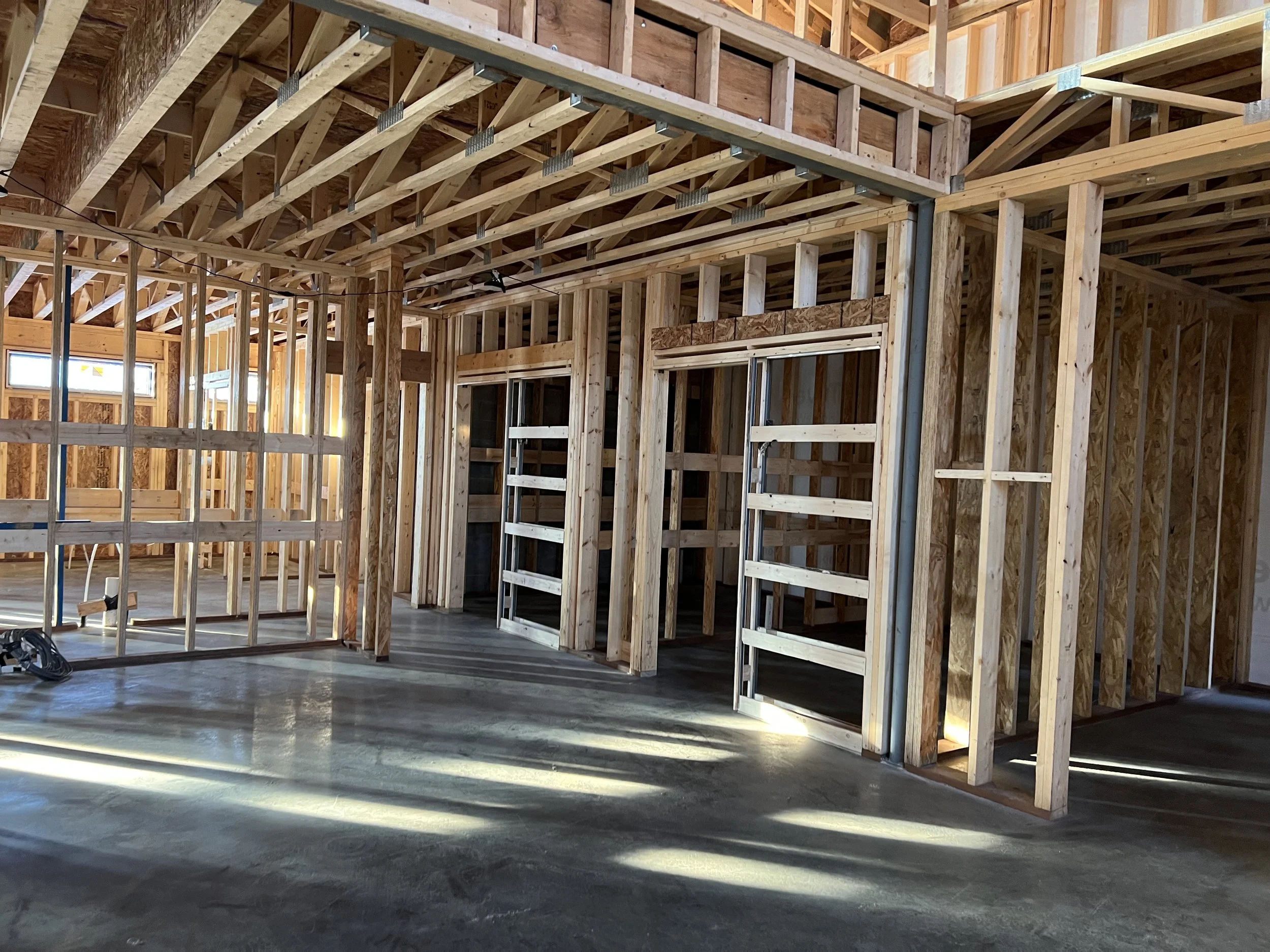 28 sprengeler-construction-barndominium-lumber-stack-loft-interior.jpeg