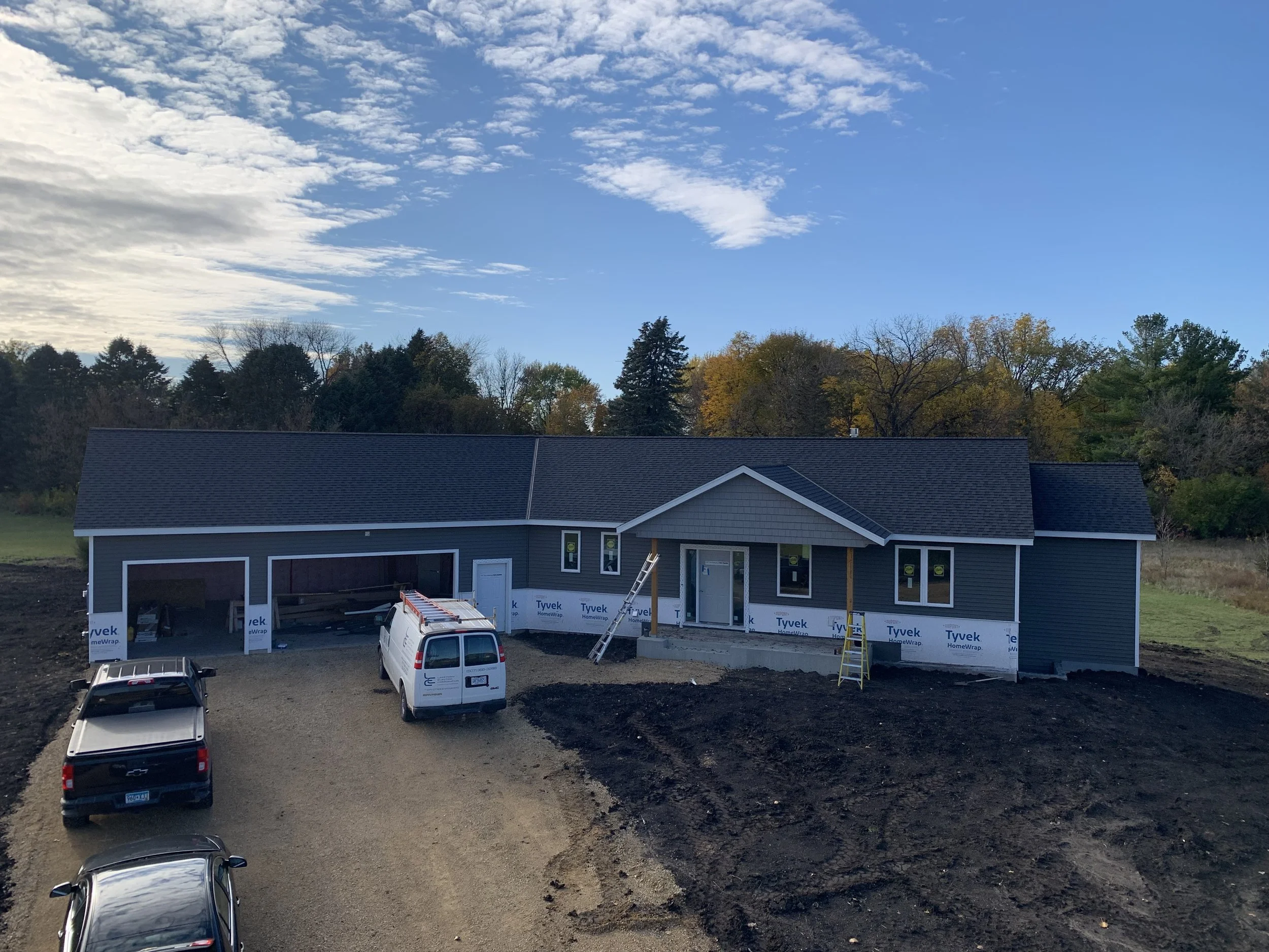 1 sprengeler-construction-custom-home-exterior-framing-garage-driveway.jpeg