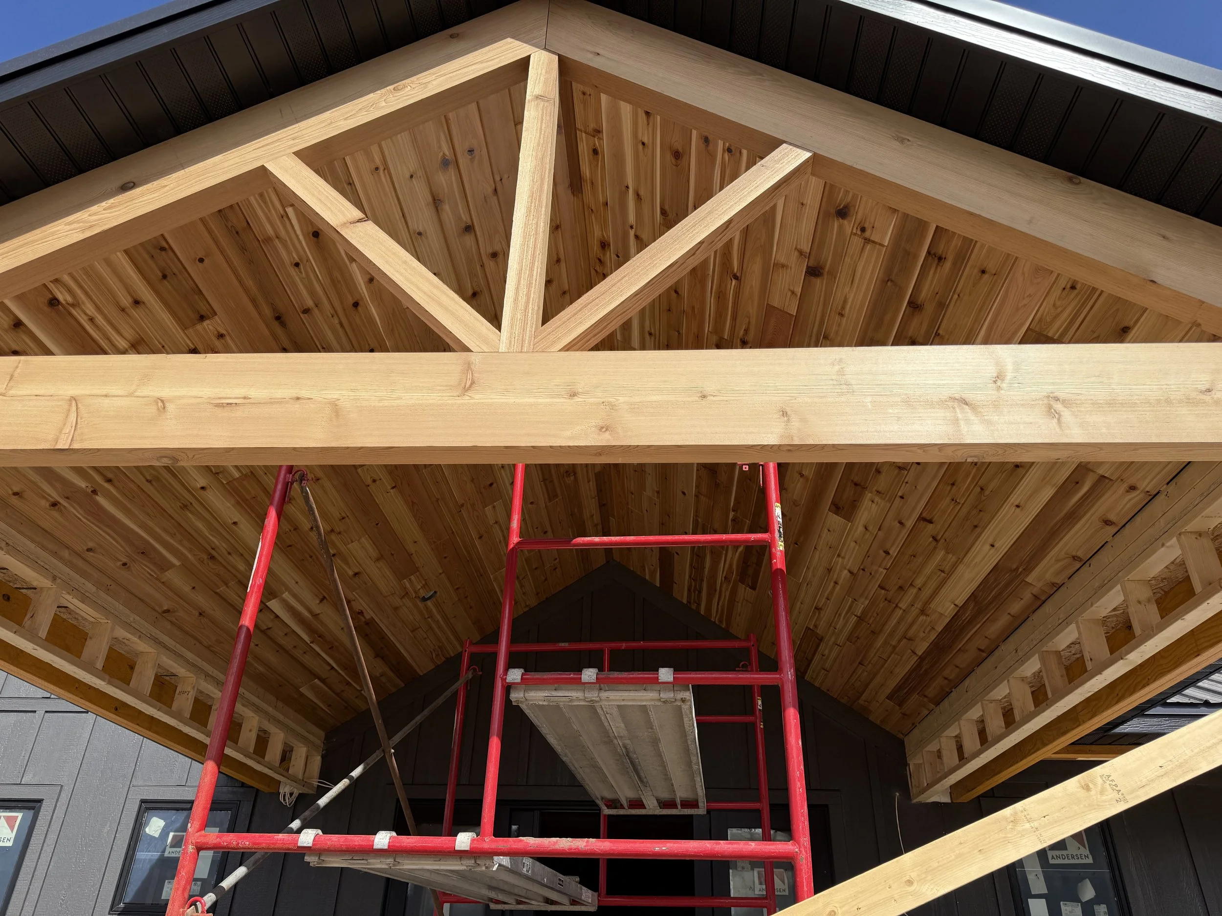 33 sprengeler-construction-barndominium-front-aerial-metal-roof-progress.jpeg