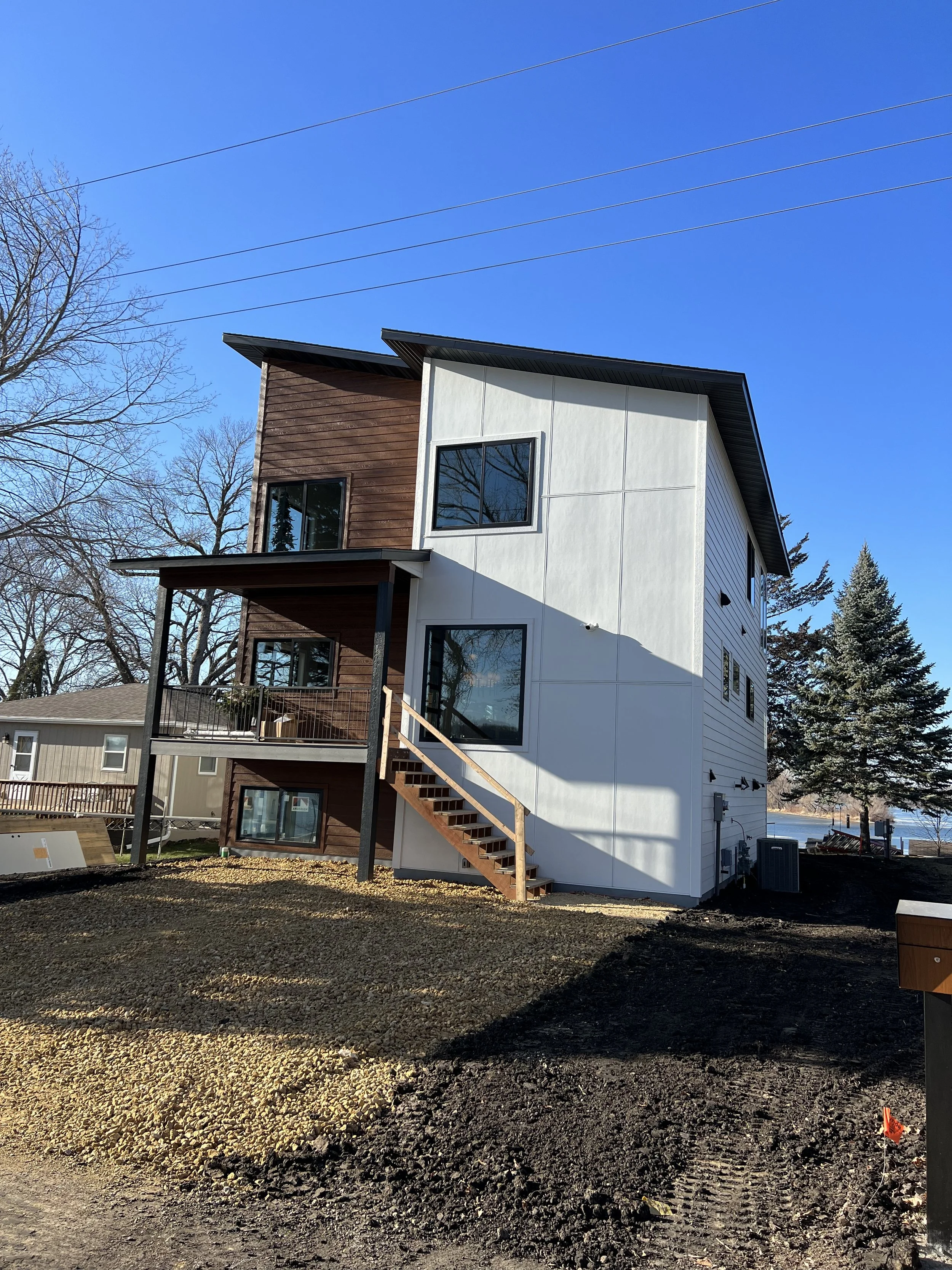 10 modern-home-exterior-rear-elevation-lakeside-finished.jpeg