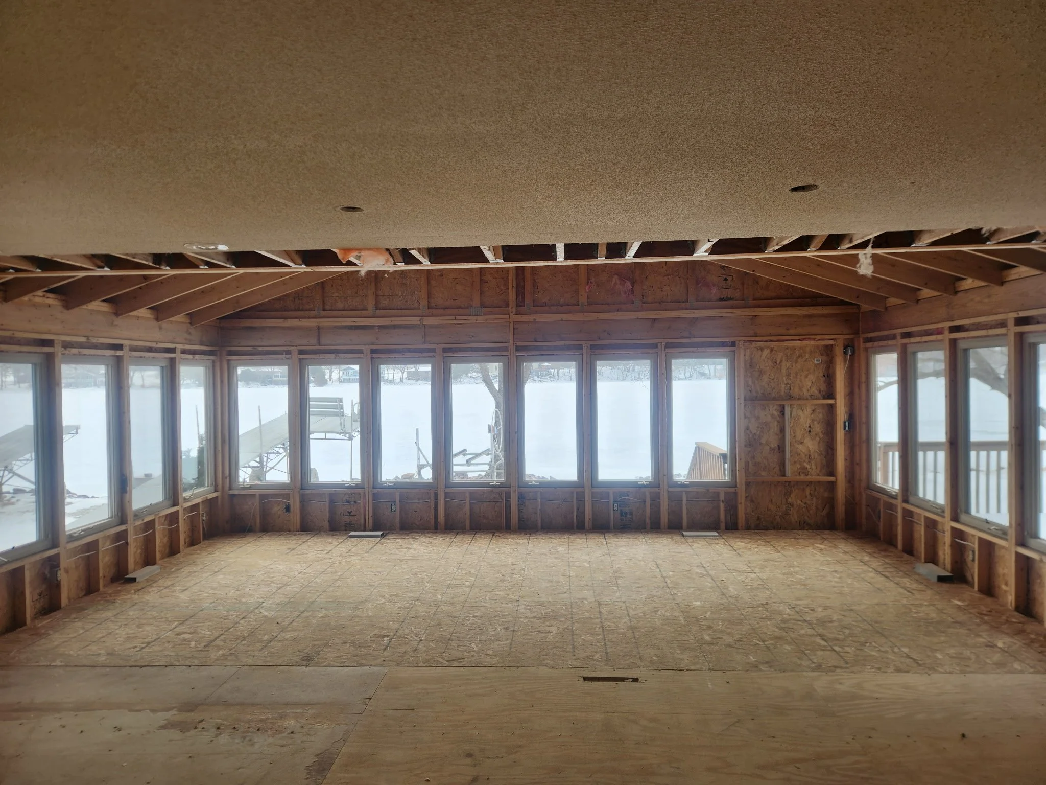 sprengeler-construction-remodel-lake-home-interior-demolition-open-view-windows.jpg