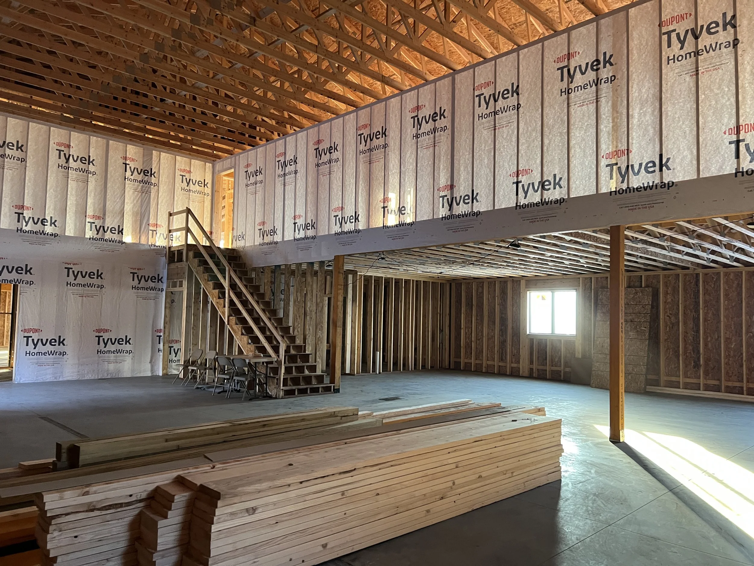 29 sprengeler-construction-barndominium-fireplace-chase-two-story-framing.jpeg