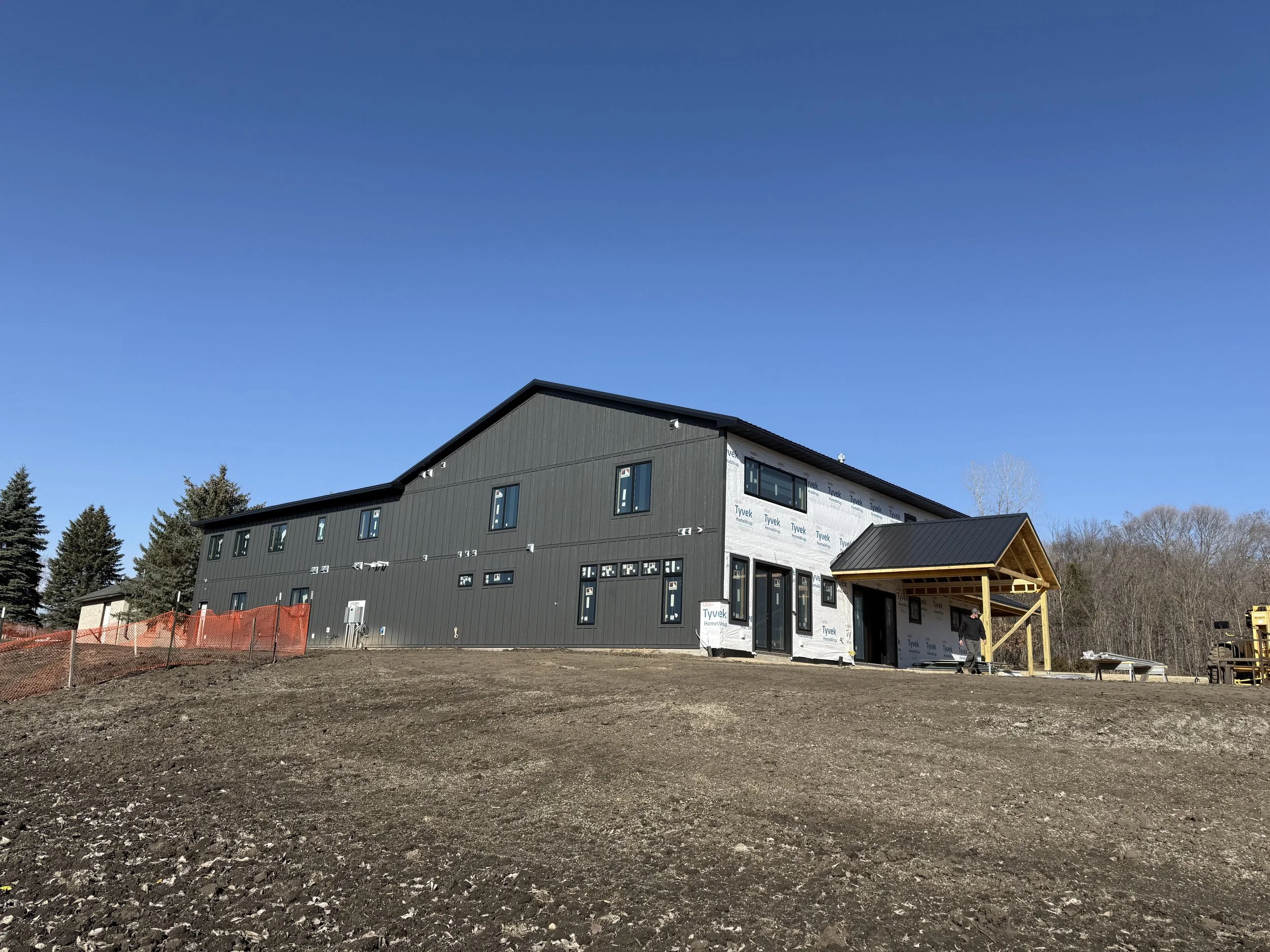 32 sprengeler-construction-barndominium-cedar-porch-ceiling-truss-detail.jpeg