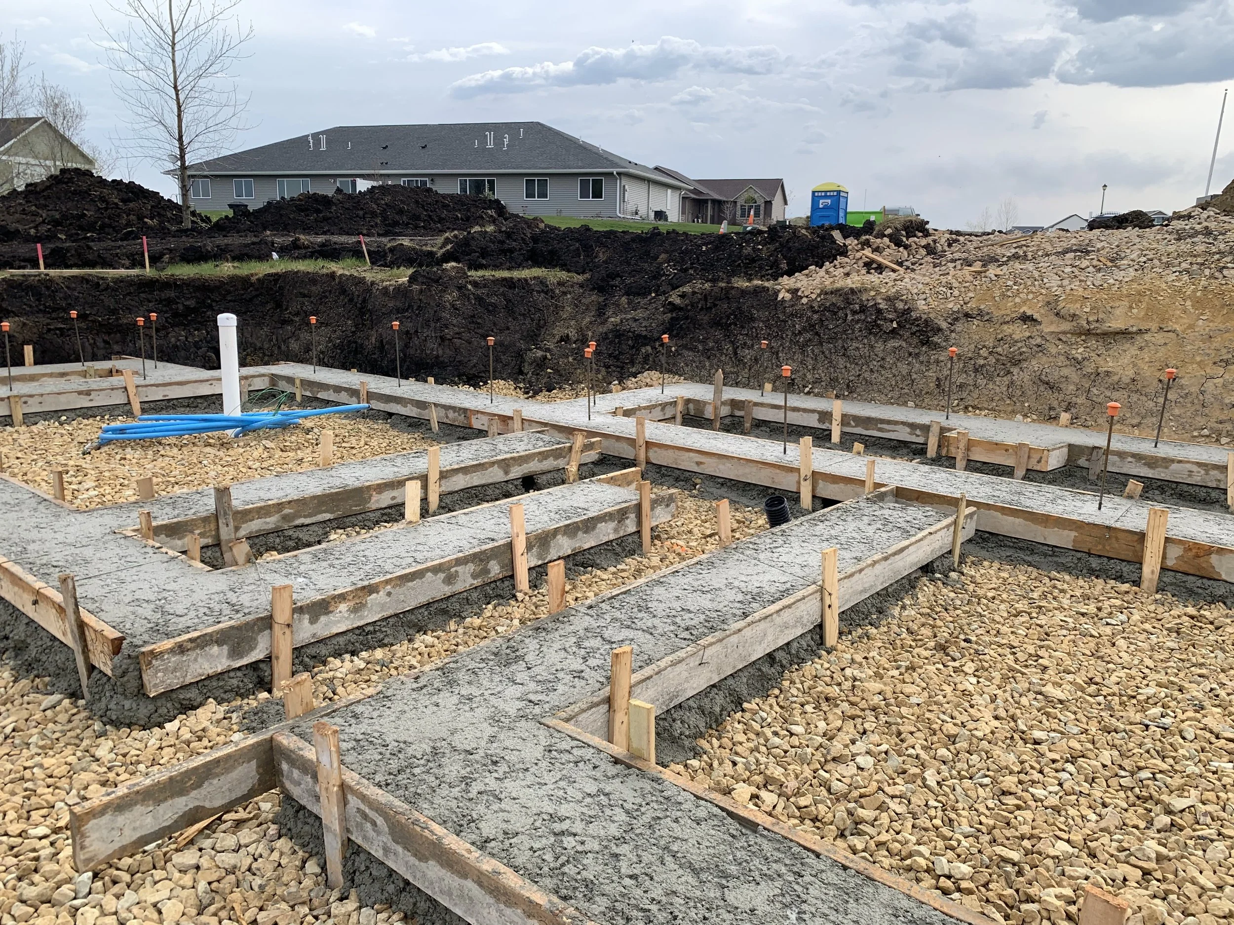 2 sprengeler-construction-poured-concrete-footings-foundation-grid.jpeg