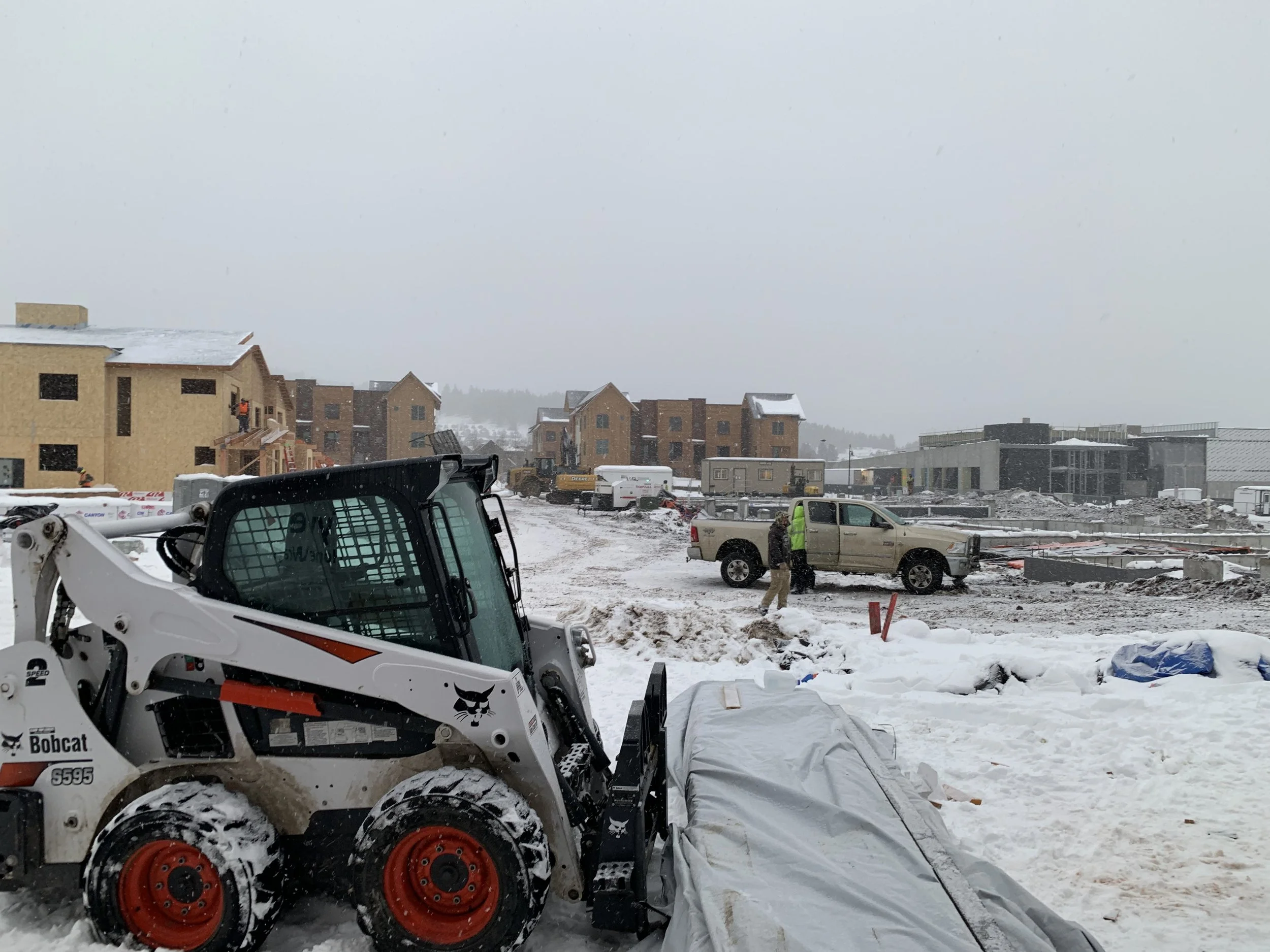sprengeler-construction-snowy-construction-site-bobcat-equipment.jpeg