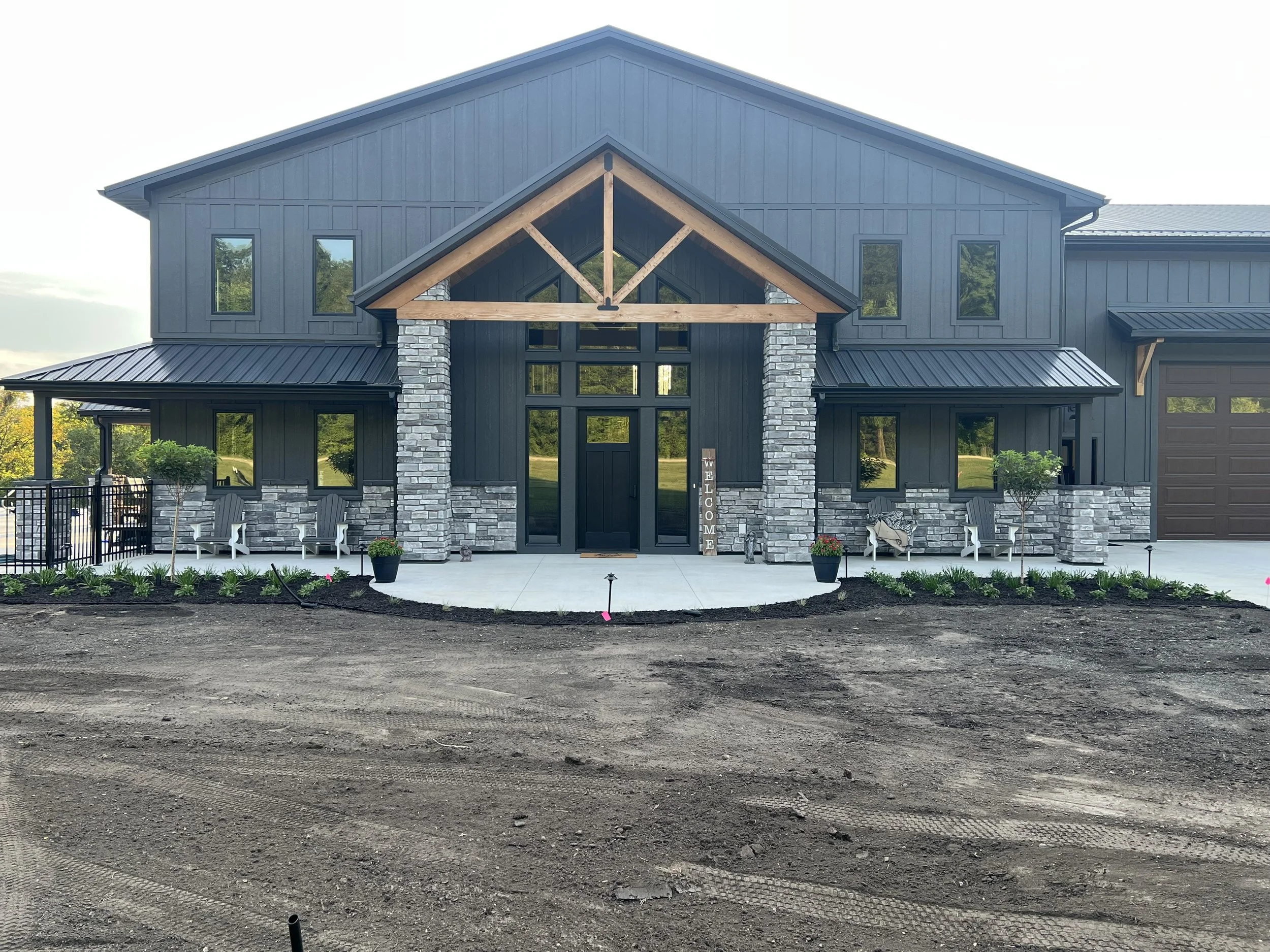 57 sprengeler-construction-modern-barndominium-front-elevation.jpeg