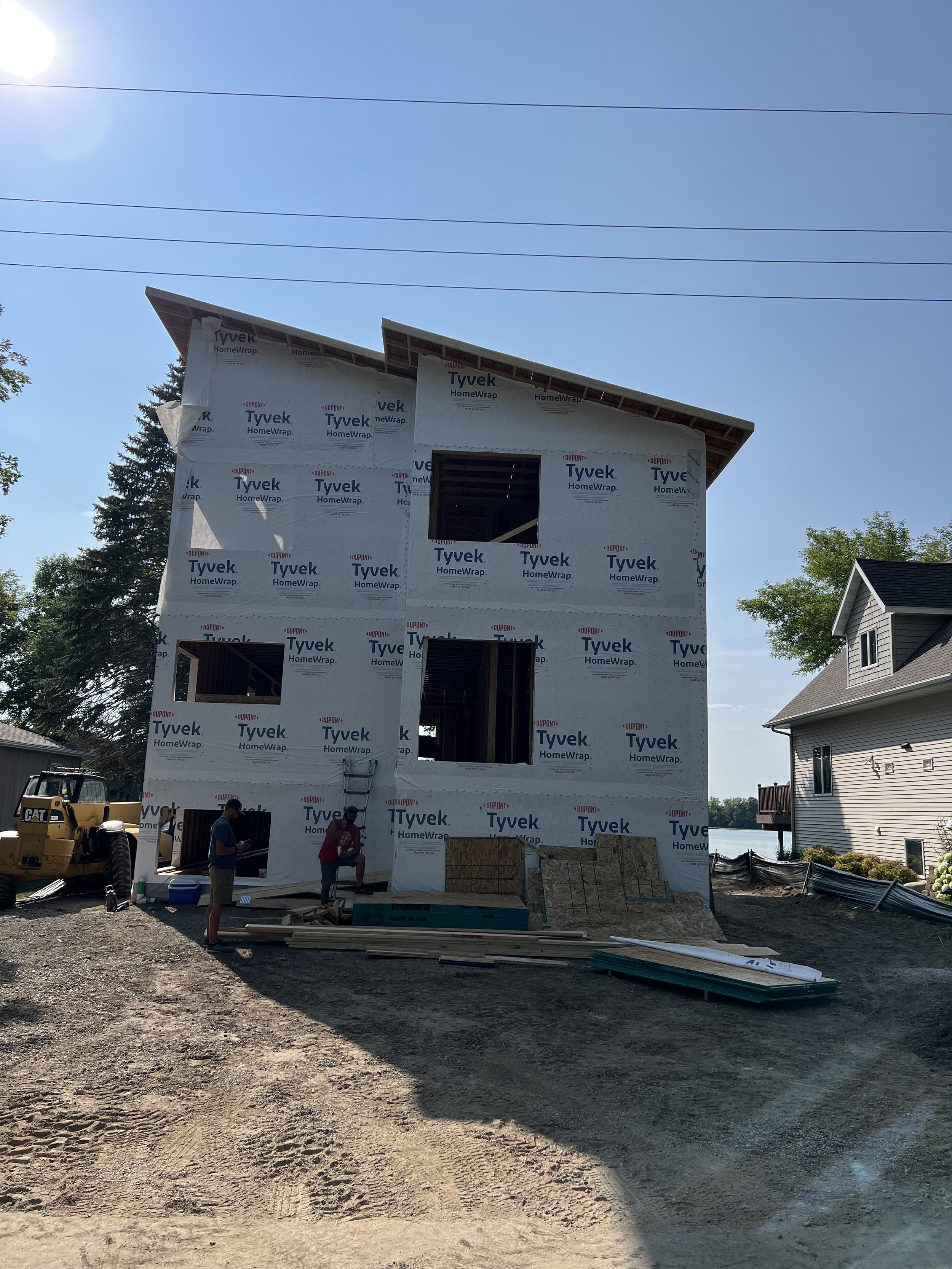 6 modern-home-tyvek-wrap-exterior-construction-phase.jpeg