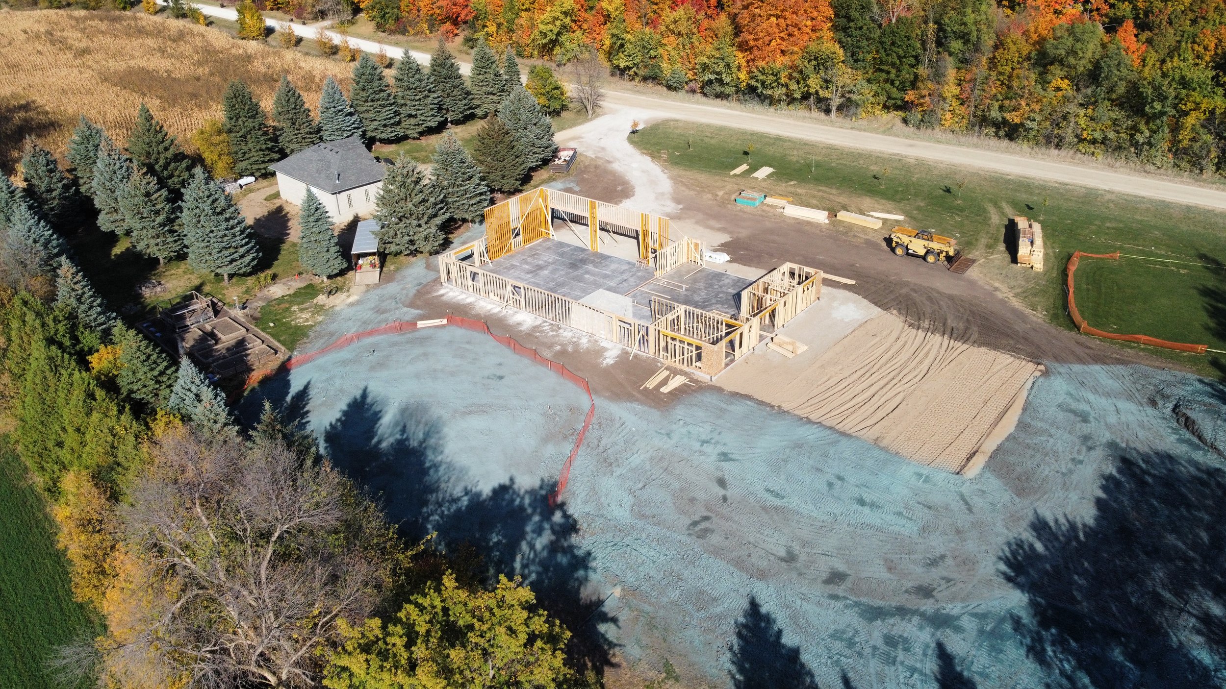 15 sprengeler-construction-barndominium-framing-and-slab-complete-aerial..JPG
