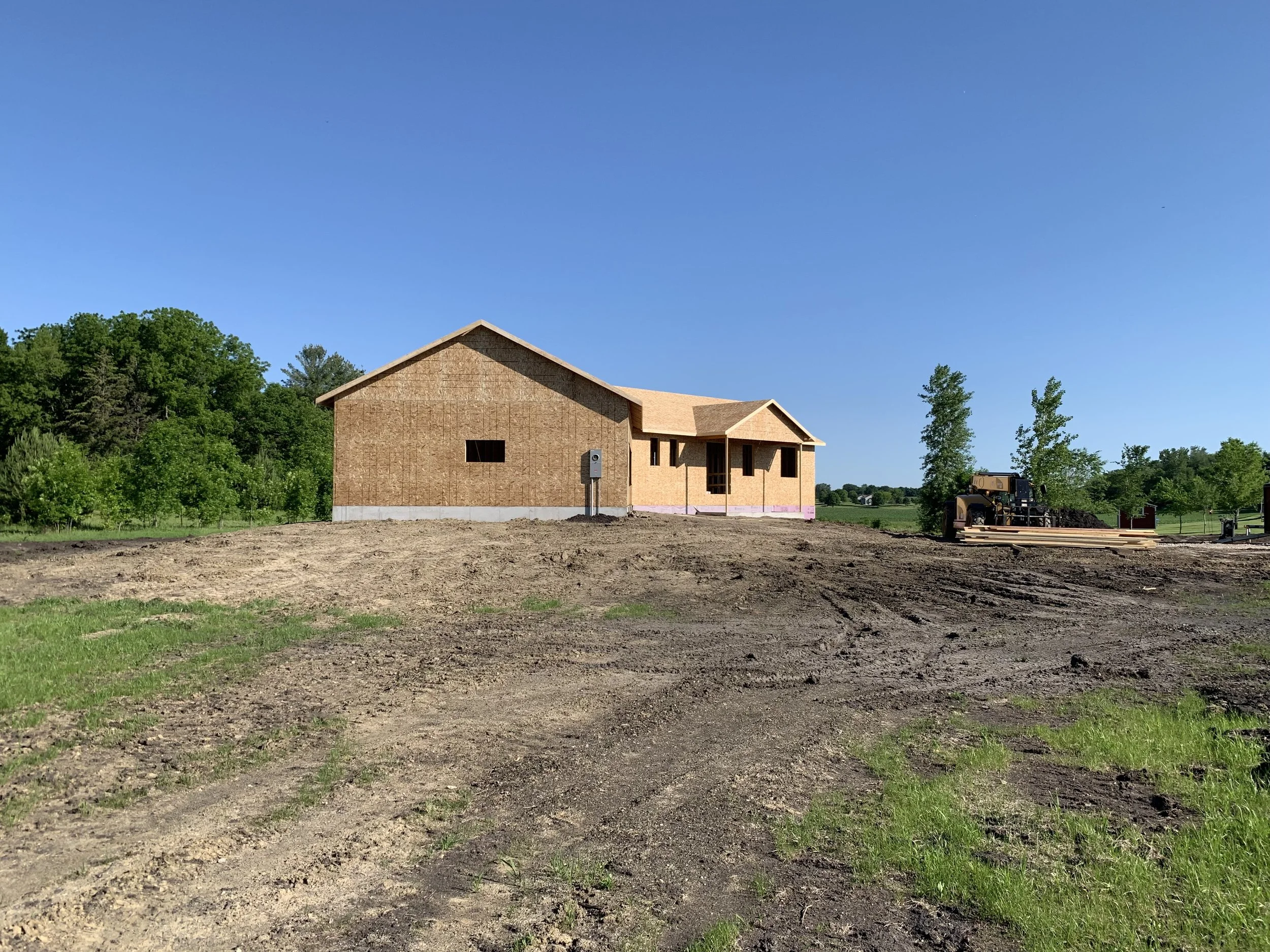 9 sprengeler-construction-sheathed-home-exterior-osb-installation.jpeg