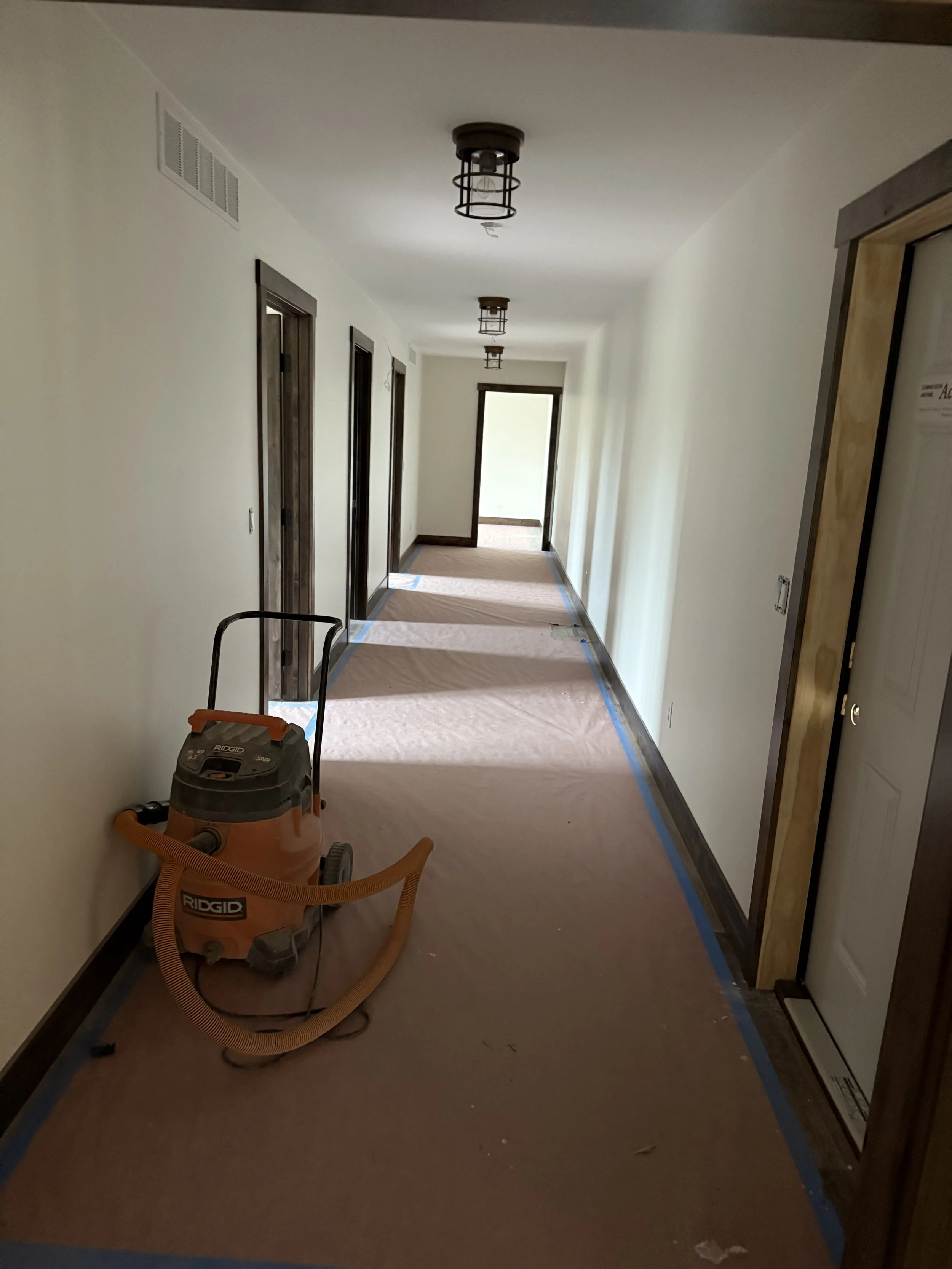 48 sprengeler-construction-hallway-finish-work-in-progress.jpeg