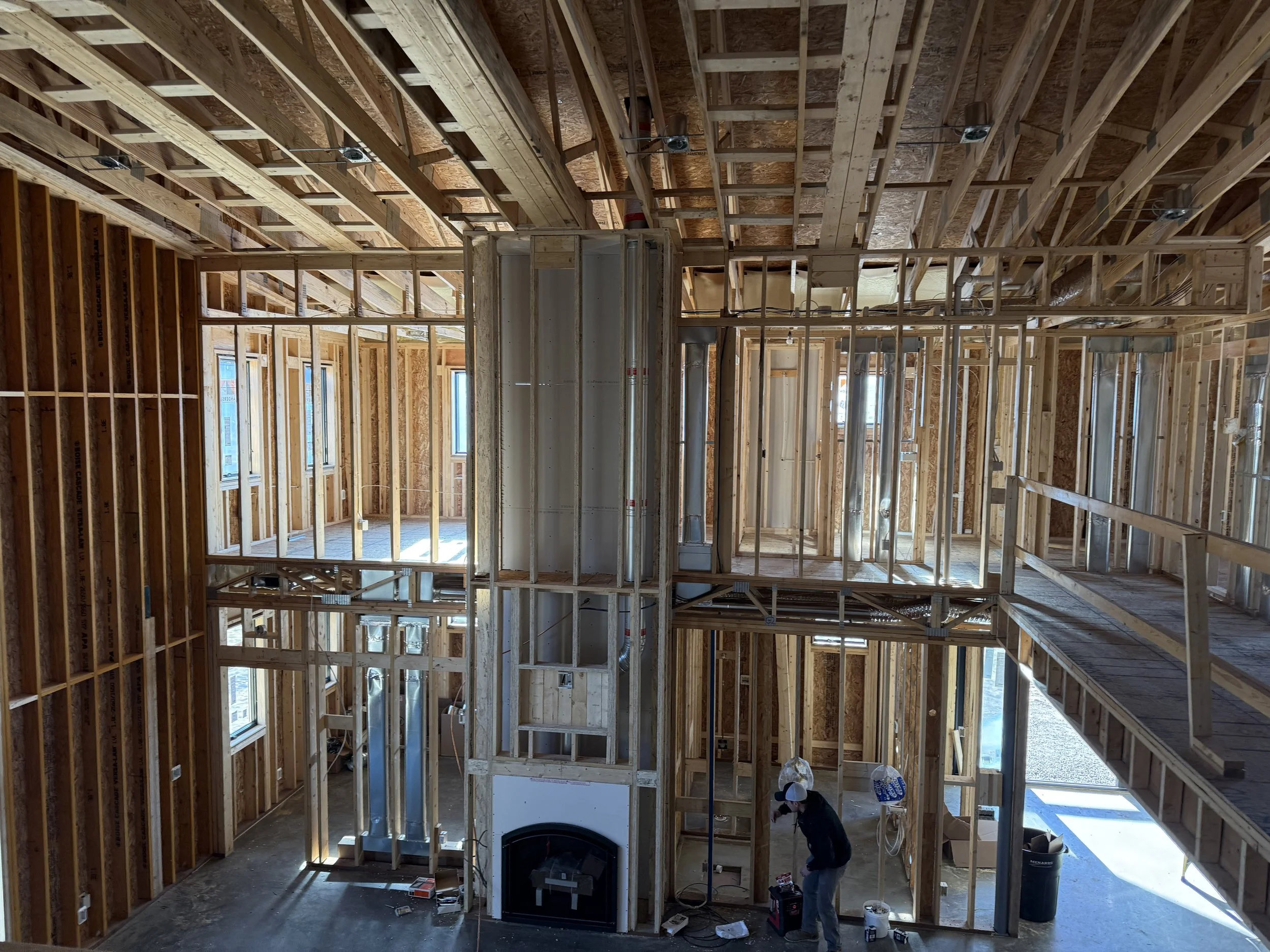 30 sprengeler-construction-barndominium-side-elevation-housewrap-and-lift.jpeg