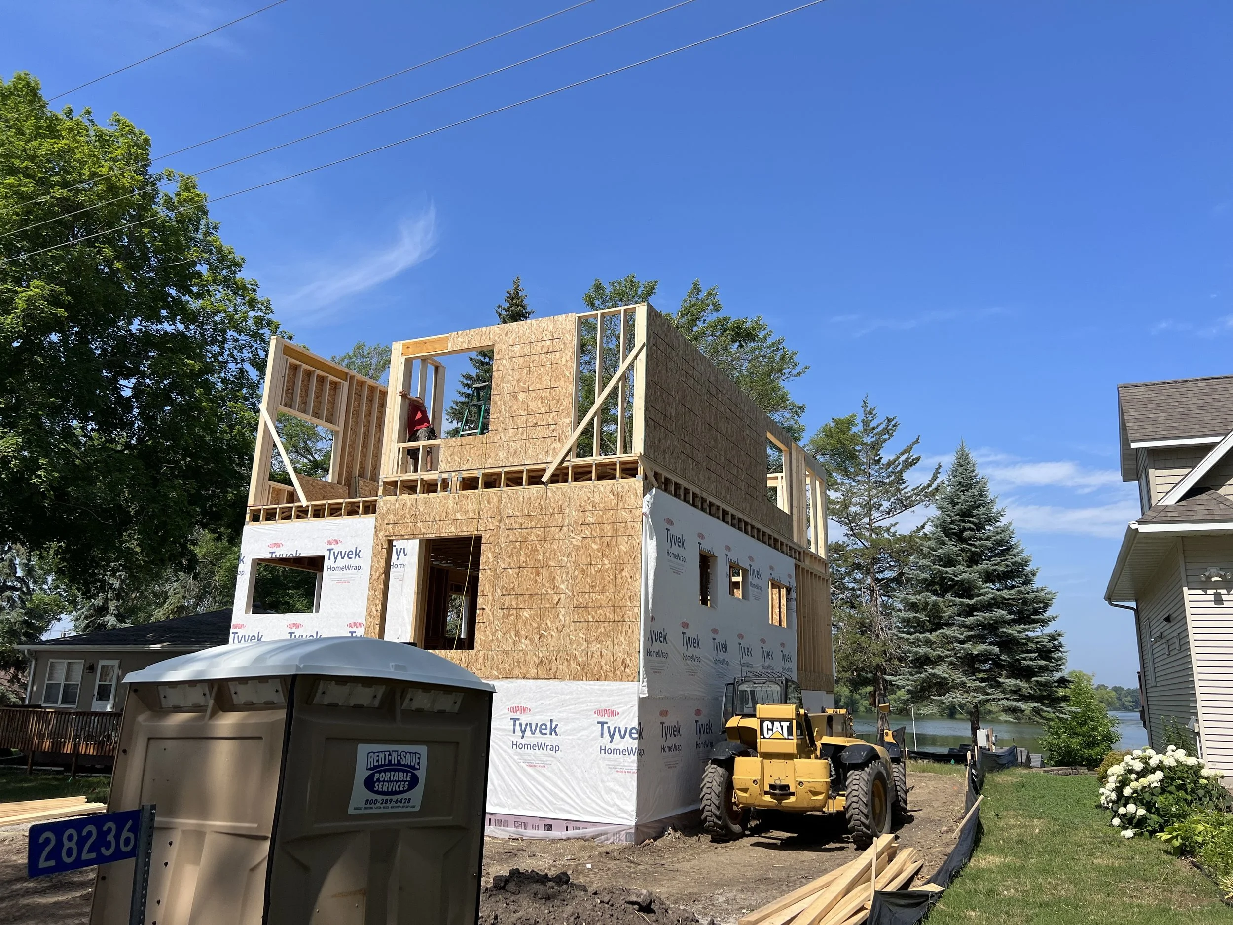 5 modern-home-framing-second-story-sheathing-construction.jpeg
