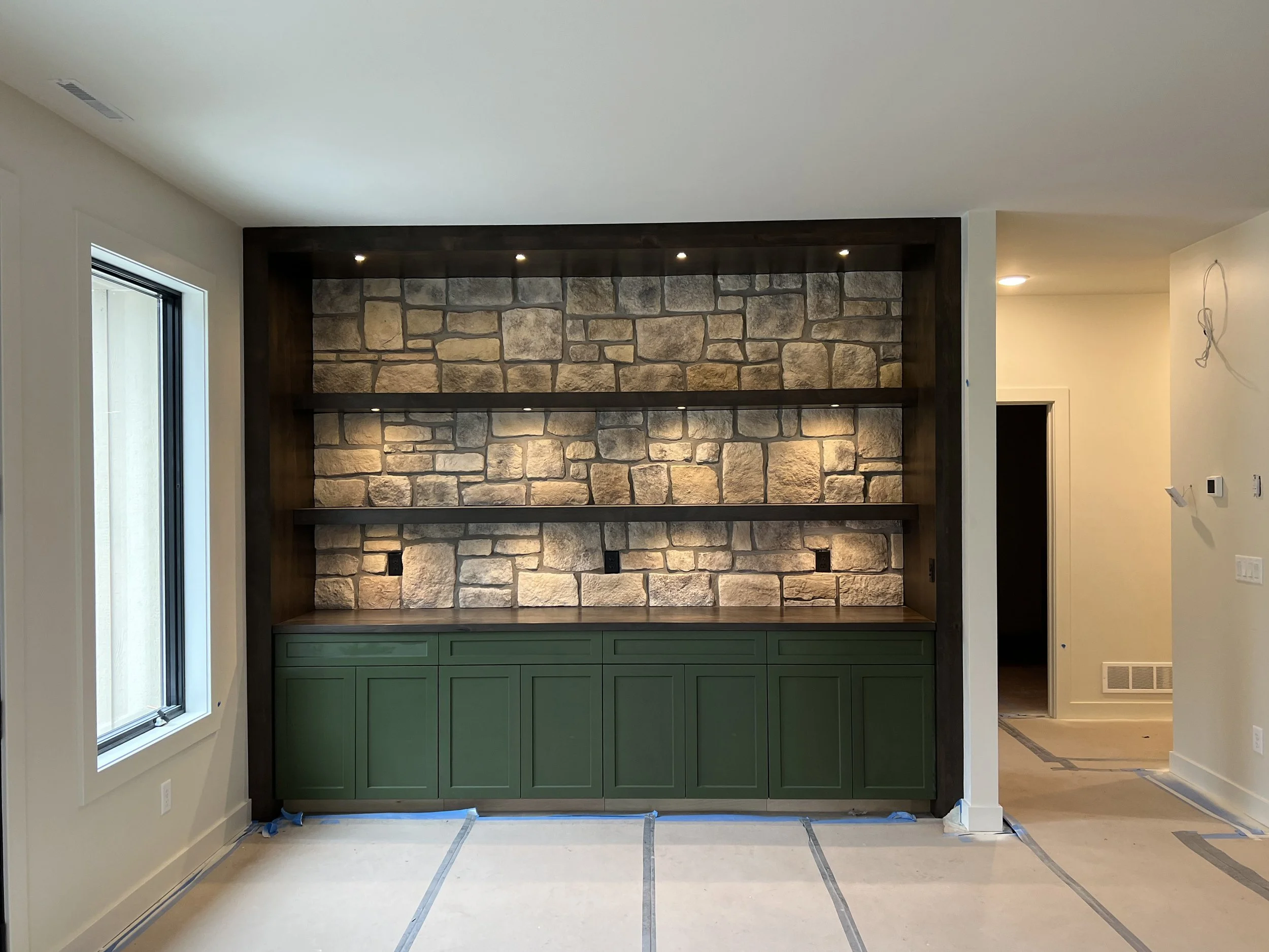6 sprengeler-construction-built-in-stone-accent-wall-cabinetry-mankato-mn.jpg