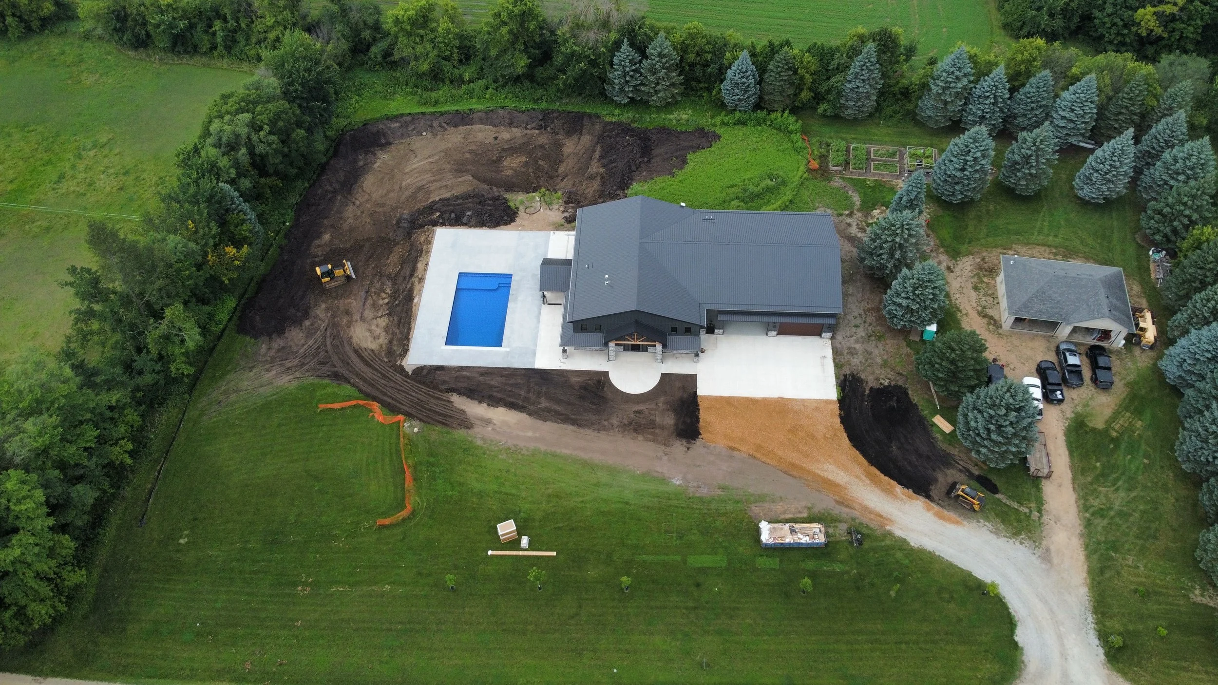 39 sprengeler-construction-aerial-complete-home-pool-landscape.JPG