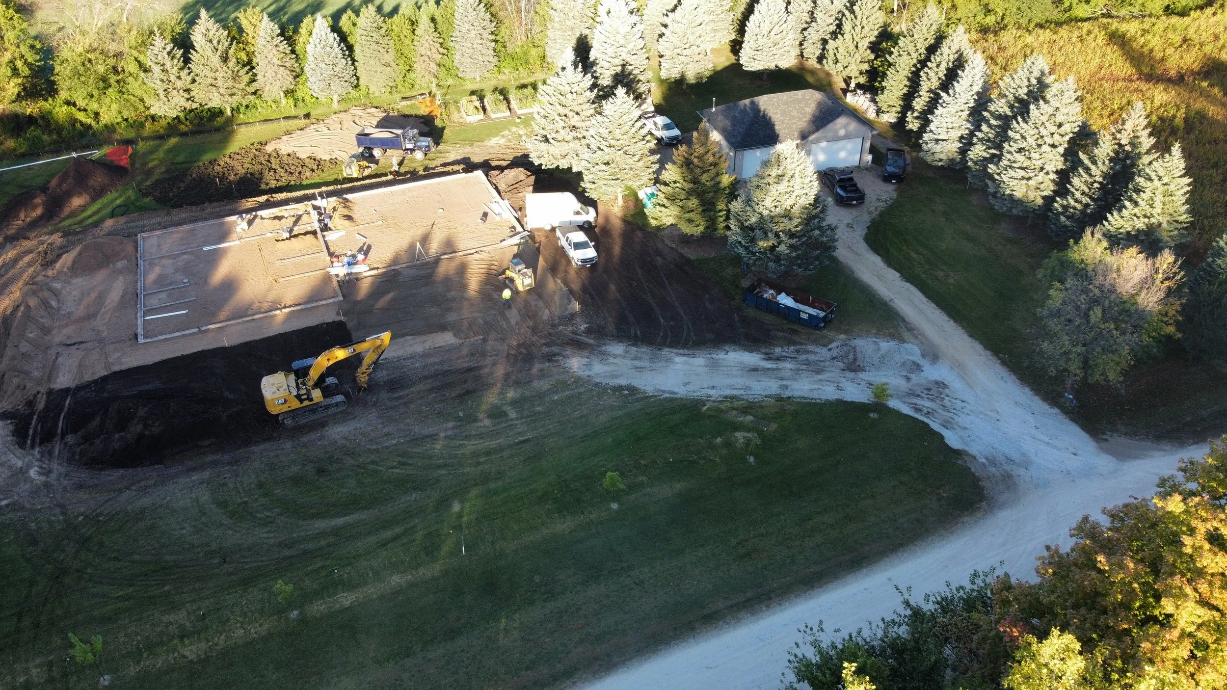 9 sprengeler-construction-barndominium-aerial-site-prep-foundation-start.JPG
