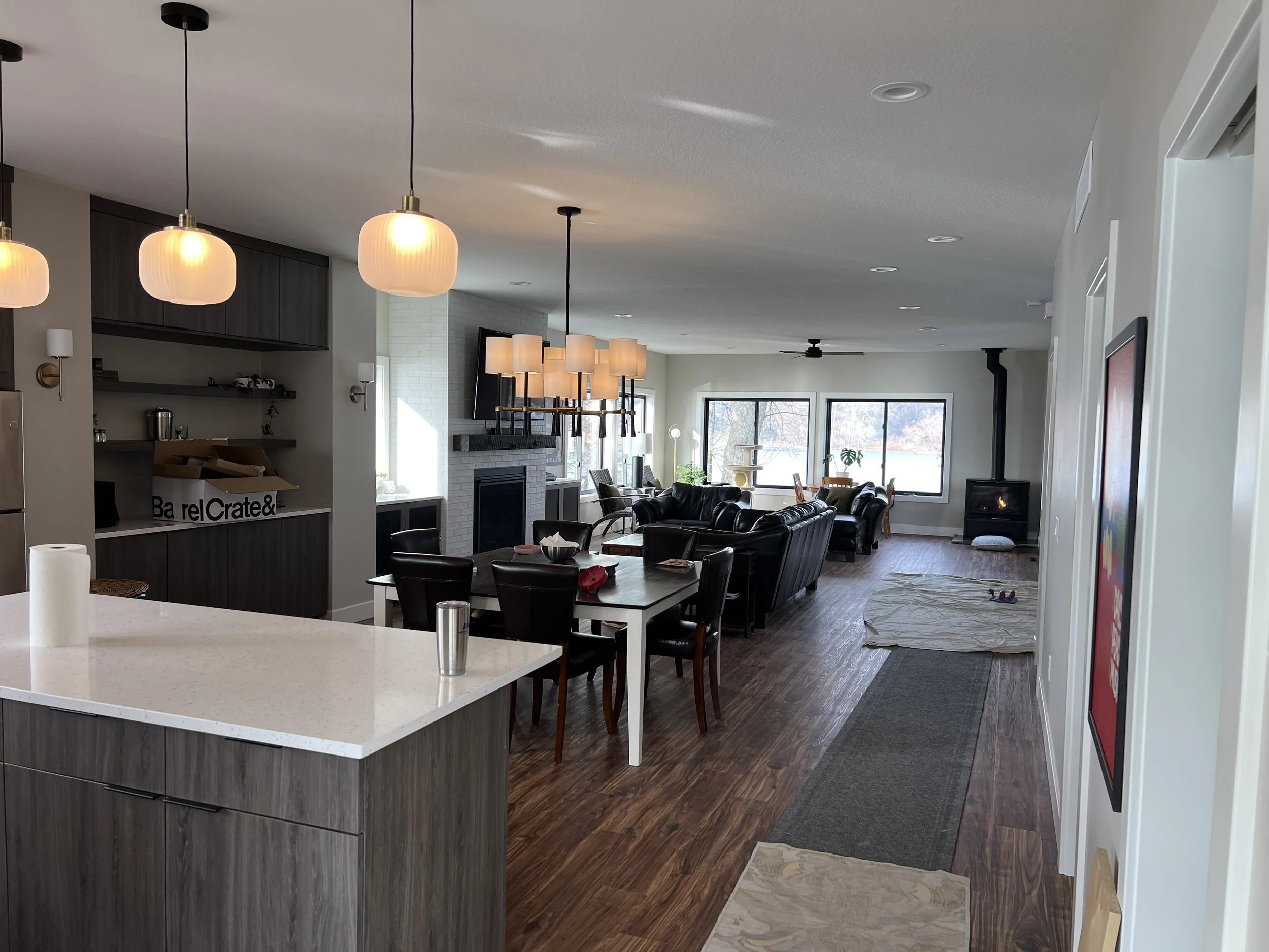 17 open-concept-living-room-kitchen-modern-lakeside-home.jpeg