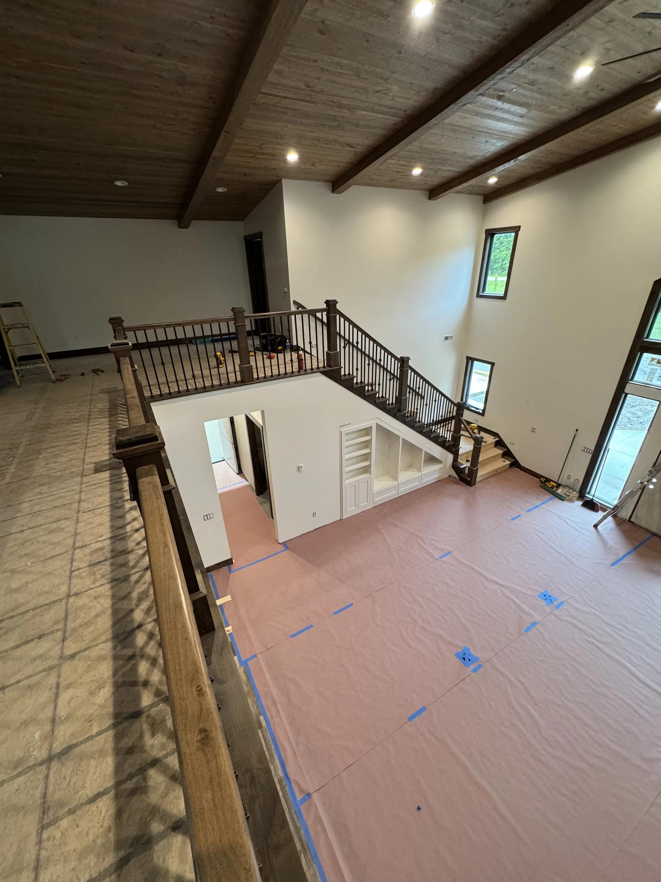 64 sprengeler-construction-two-story-living-room-loft-overlook.jpeg
