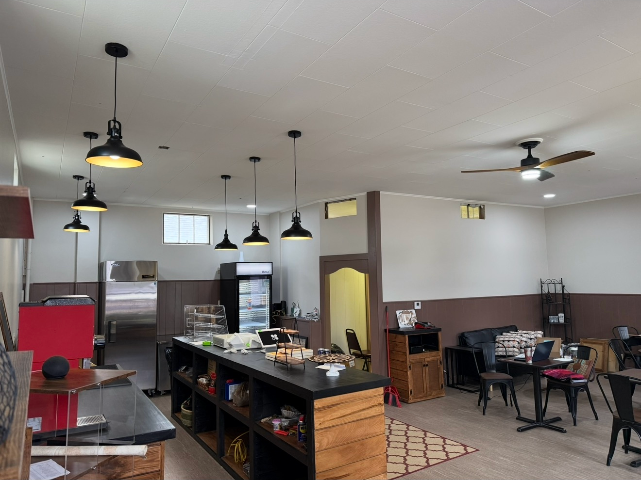 Oranssi technician working on a roof project