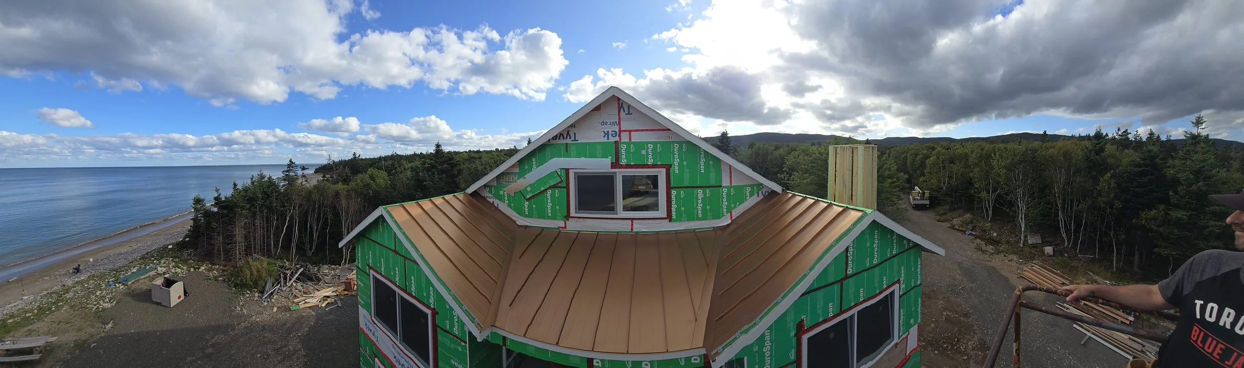 Sometimes work feels like a vacation.  Love the look of a copper penny metal roof!