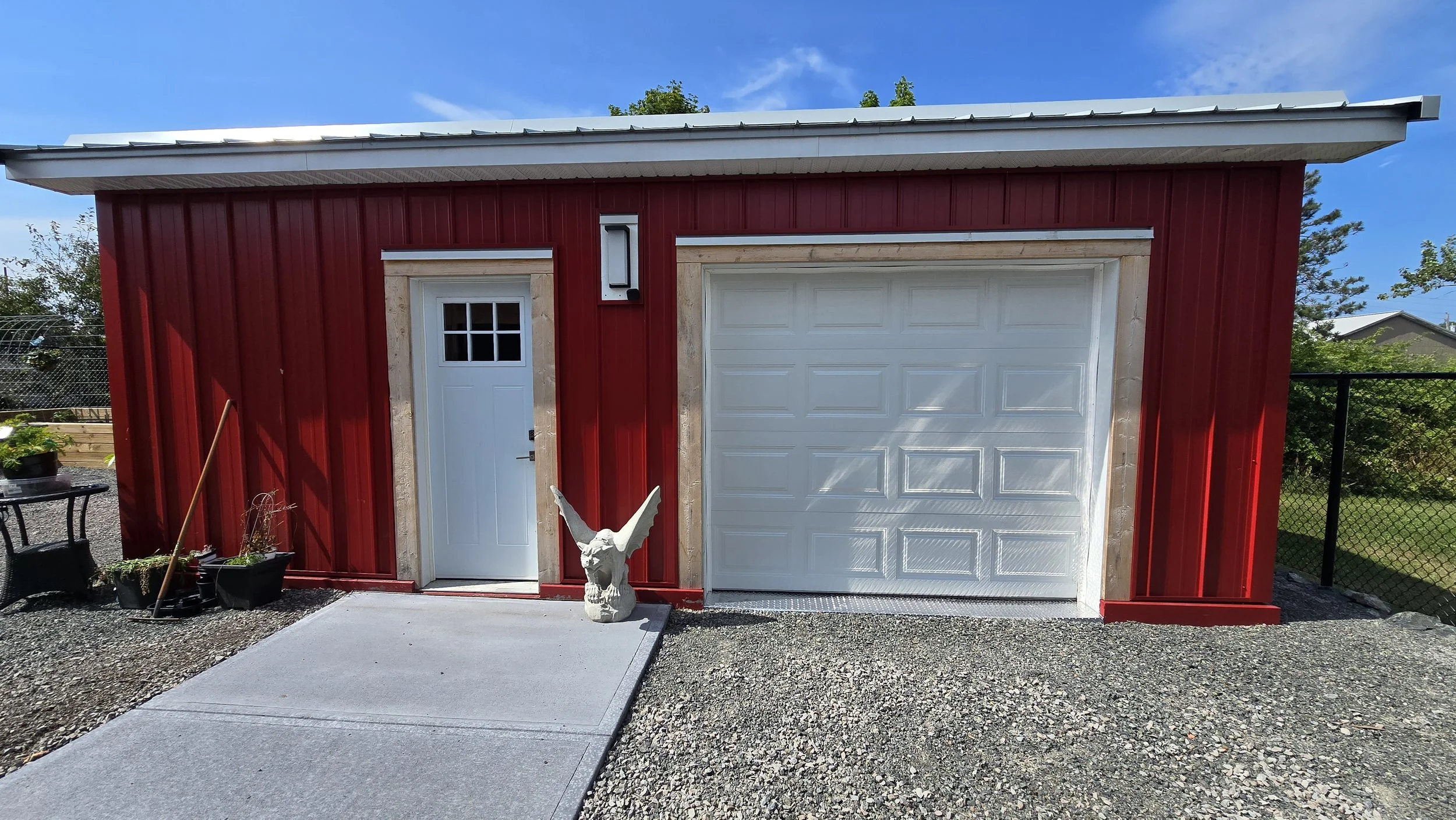 Garage complete.  Fully insulated, mini split heat pump and a full 3pc bathroom with 24" x 48" tiles.